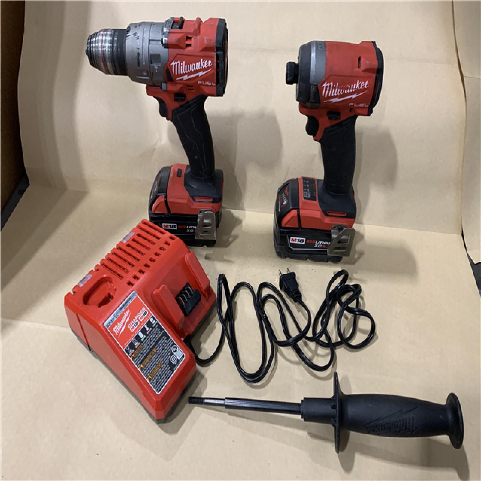AS-IS - MILWAUKEE FUEL 18V Lithium-Ion Brushless Cordless Hammer Drill and Impact Driver Combo Kit (2-Tool) with 2 Batteries