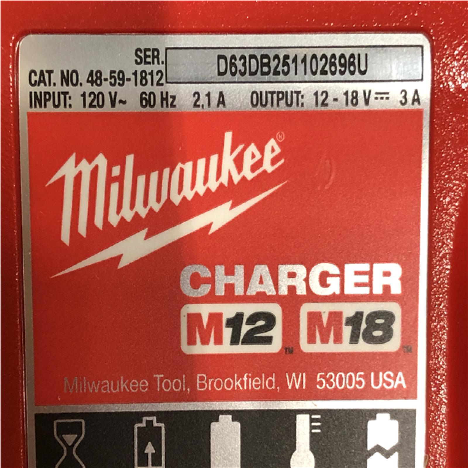 AS-IS Milwaukee 18-Volt Lithium-Ion XC Starter Kit with (2) 5.0Ah Batteries and Charger