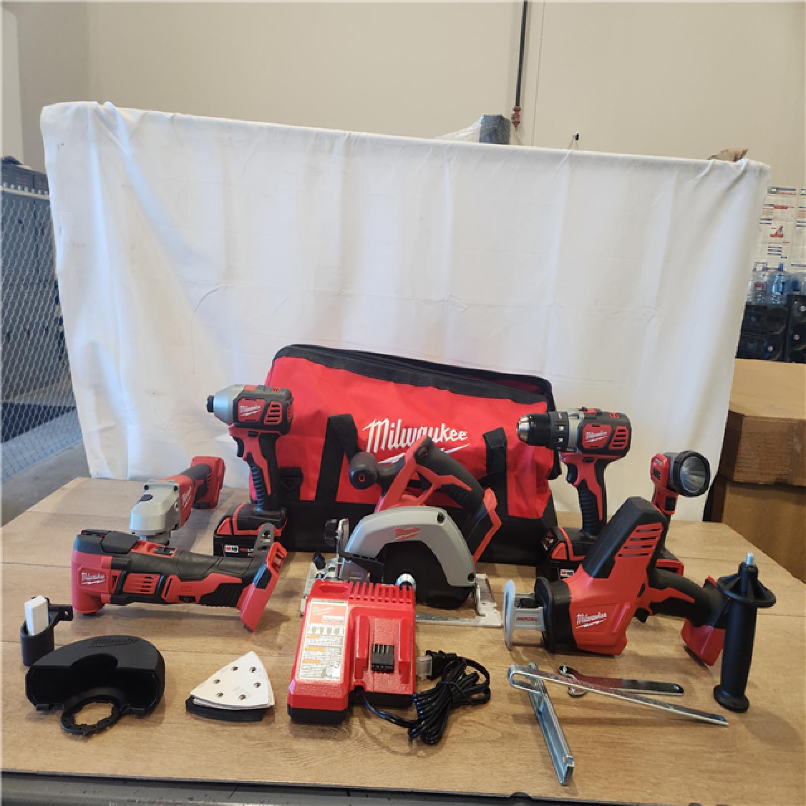 AS-IS- M18 18-Volt Lithium-Ion Cordless Combo Kit 7-Tool with 2-Batteries  Charger and Tool Bag