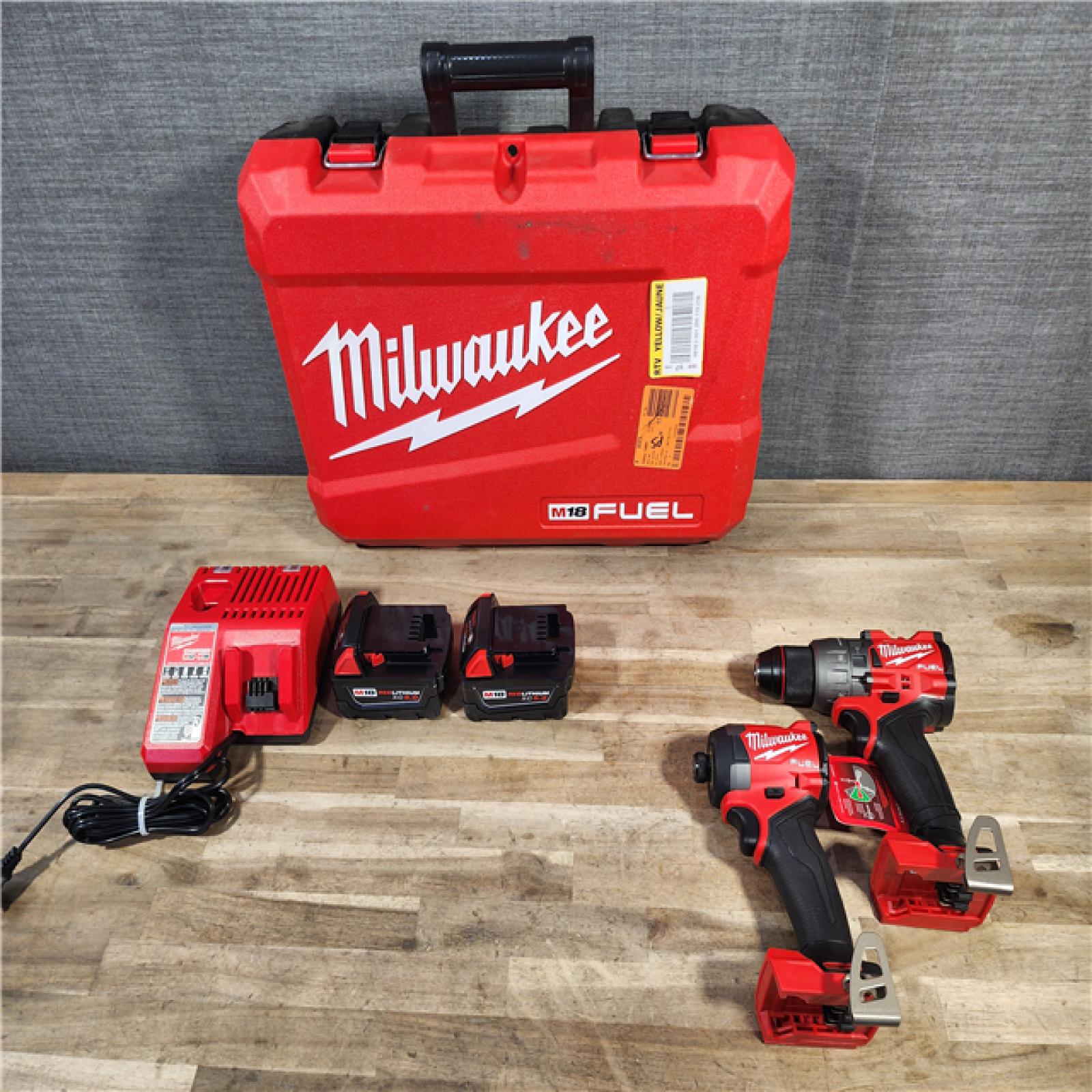 HOUSTON LOCATION - AS-IS (APPEARS LIKE NEW) MILWAUKEE FUEL 18V Lithium-Ion Brushless Cordless Hammer Drill and Impact Driver Combo Kit (2-Tool) with 2 Batteries