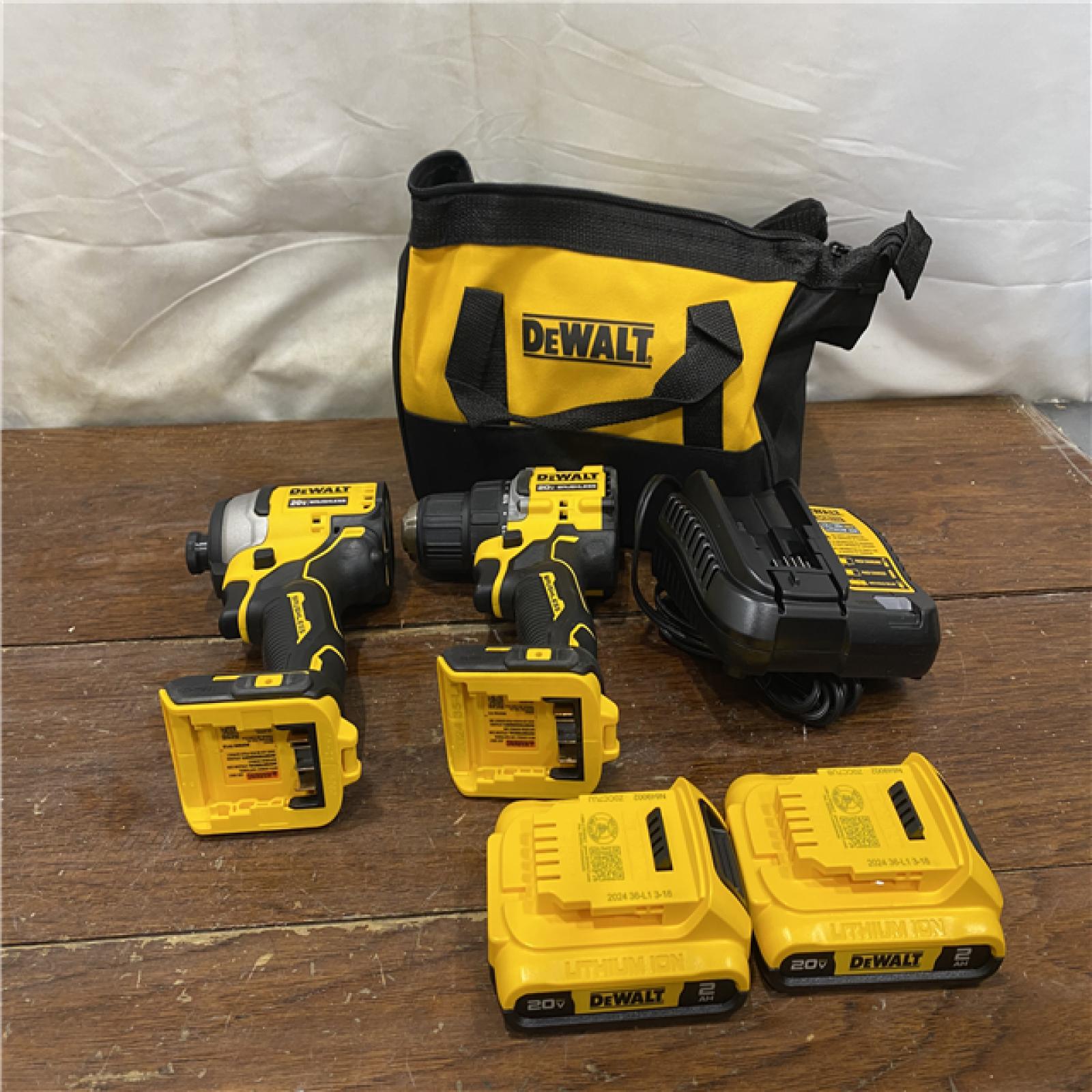 AS-IS Dewalt DCK225D2 20V MAX ATOMIC Brushless Compact Lithium-Ion 1/2 in. Cordless Drill Driver and 1/4 in. Impact Driver Combo Kit with 2 Batteries 2 Ah