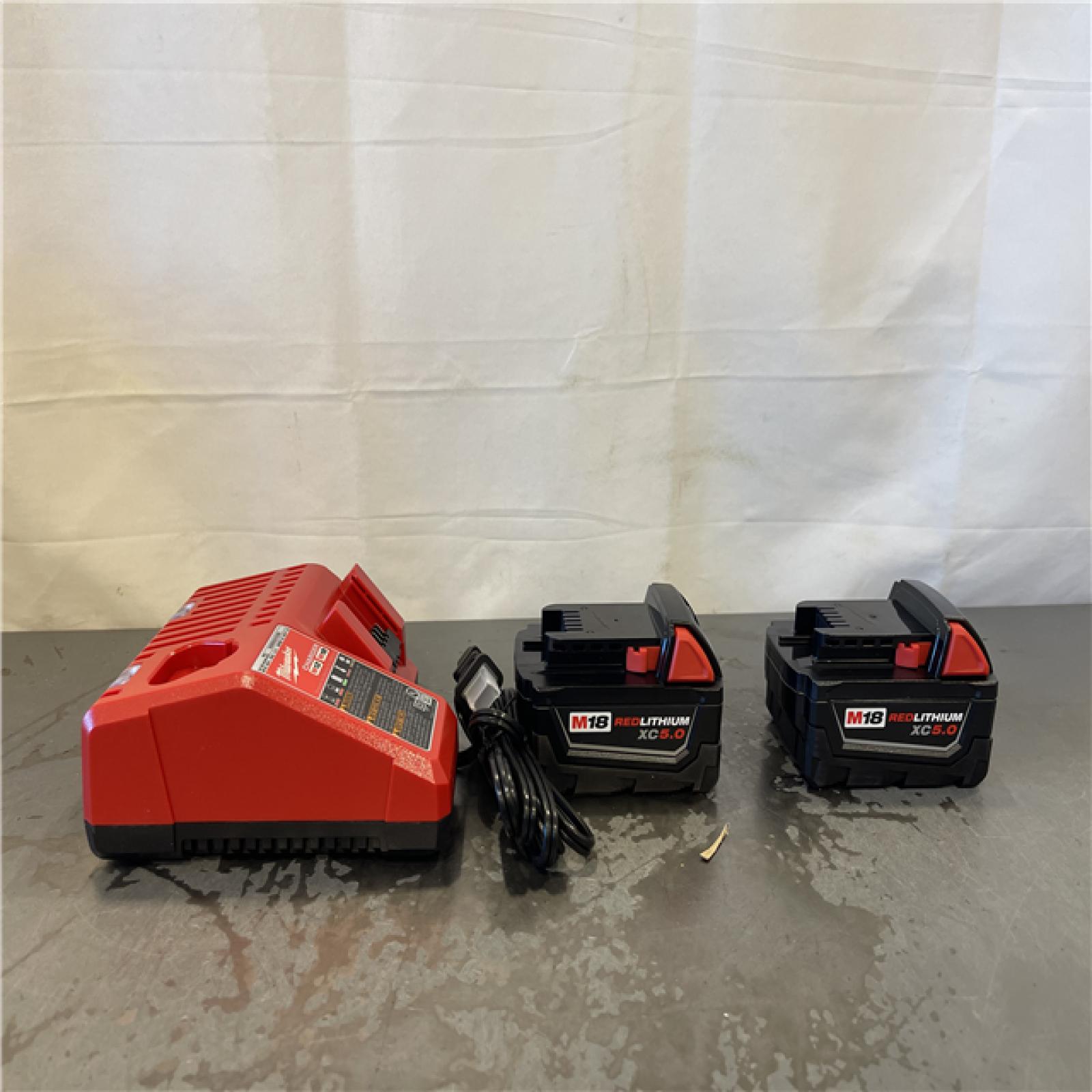AS-IS- M18 18-Volt Lithium-Ion XC Starter Kit with Two 5.0Ah Batteries and Charger