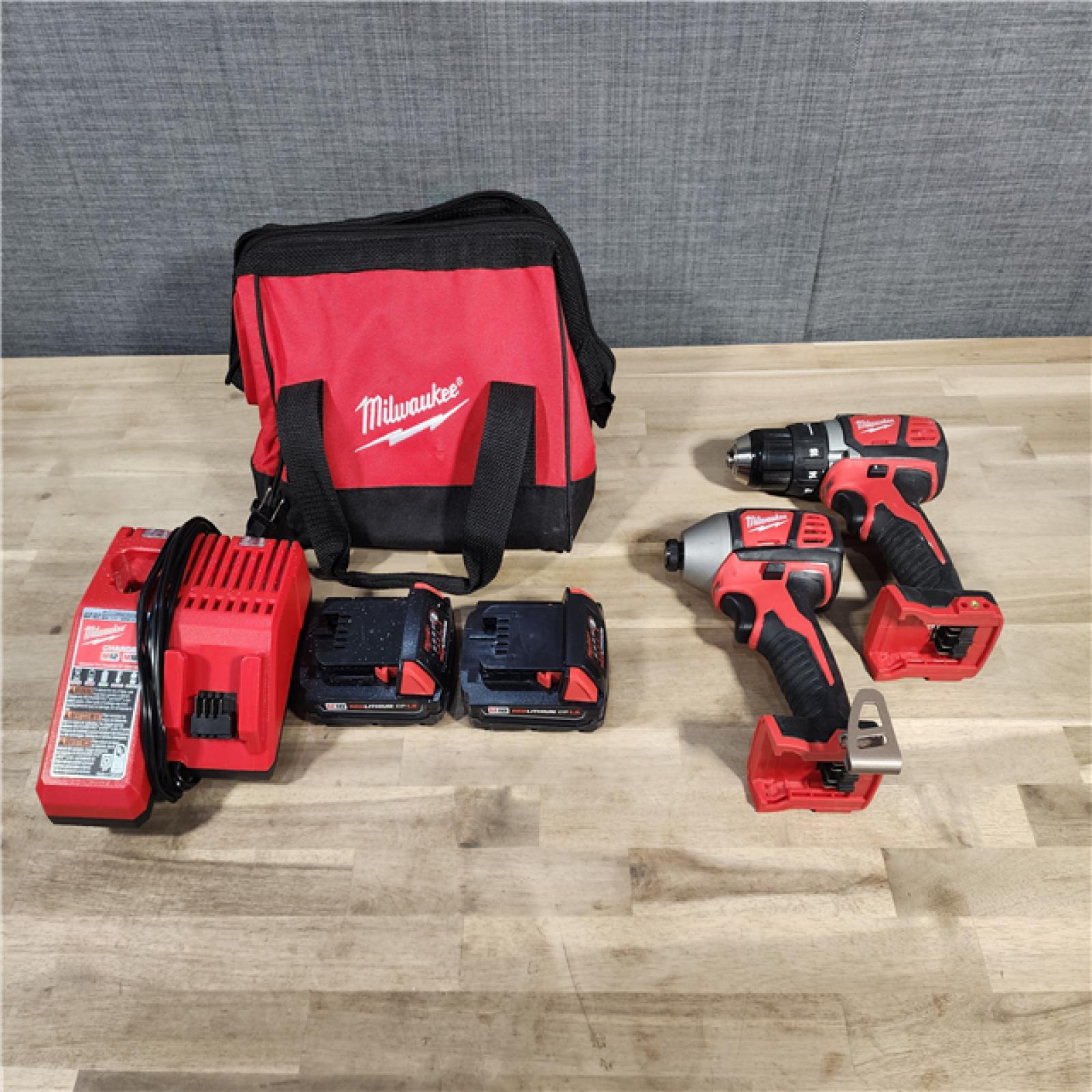 HOUSTON LOCATION - AS-IS Milwaukee M18 18V Cordless Brushed 2 Tool Drill/Driver and Impact Driver Kit