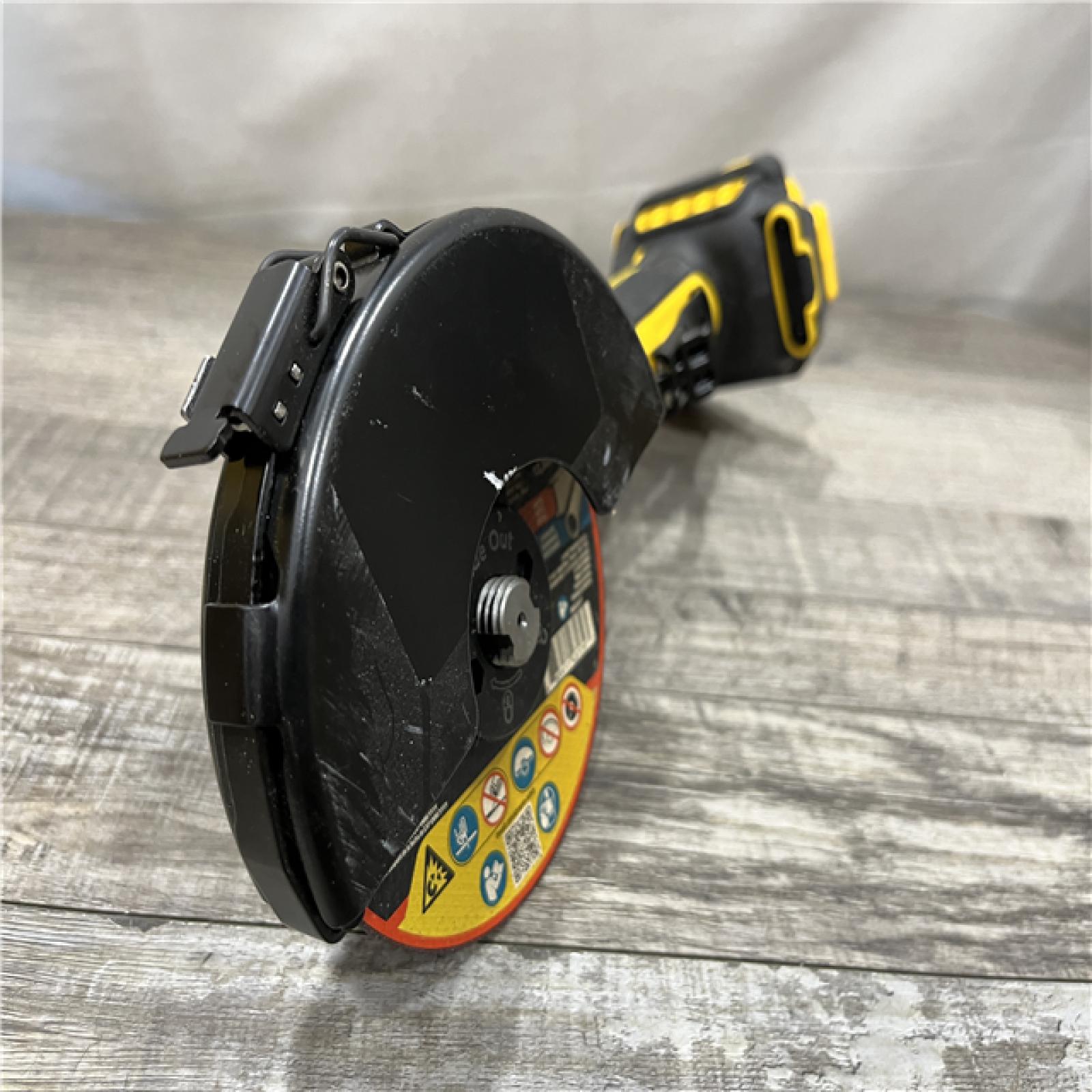 AS-IS DEWALT ATOMIC 20V MAX Cordless 4-1/2 in. Angle Grinder with Paddle Switch (Tool Only)