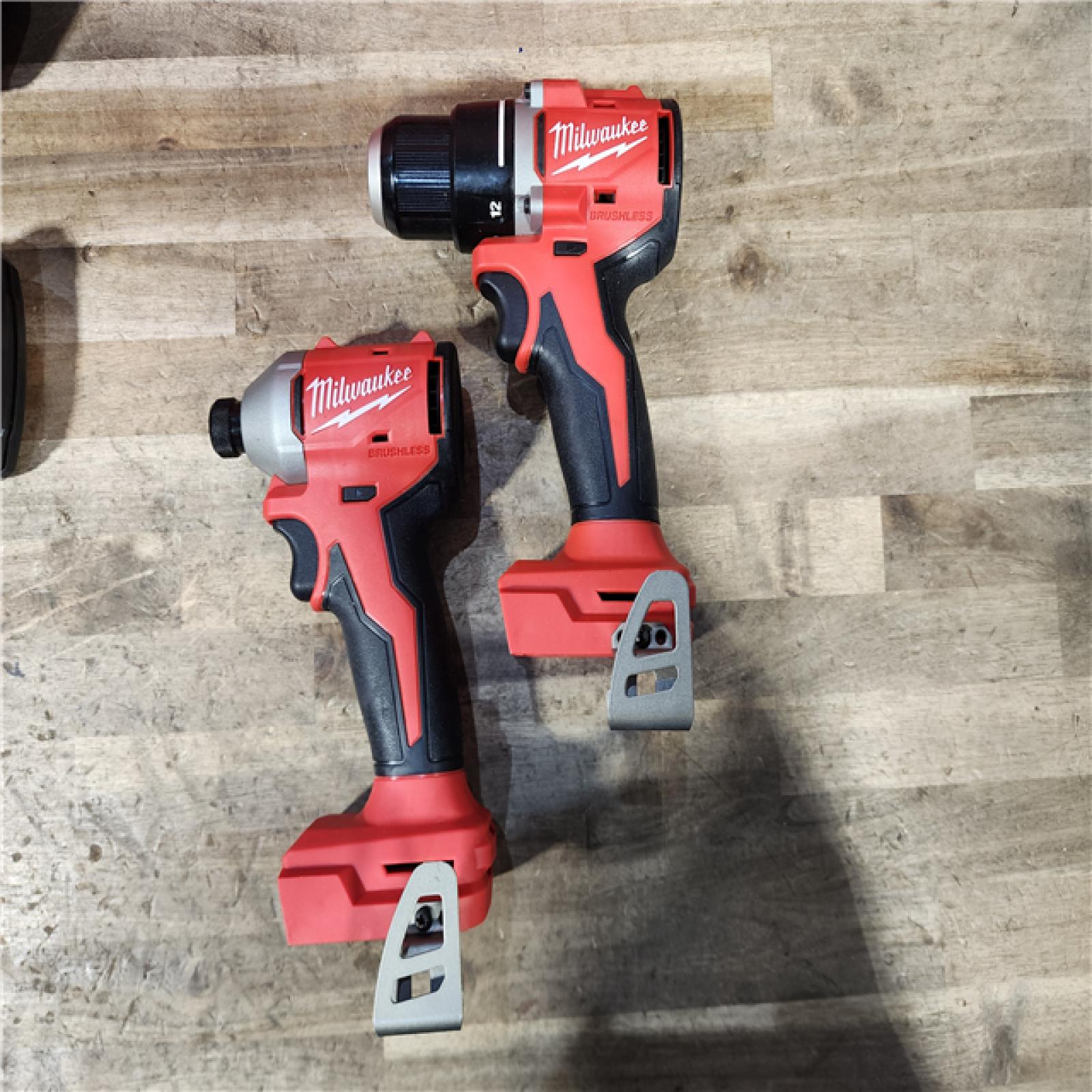 HOUSTON LOCATION - AS-IS Milwaukee M18 18V Lithium-Ion Brushless Cordless Compact Drill/Impact Combo Kit (2-Tool) W/(2) 2.0 Ah Batteries  Charger & Bag