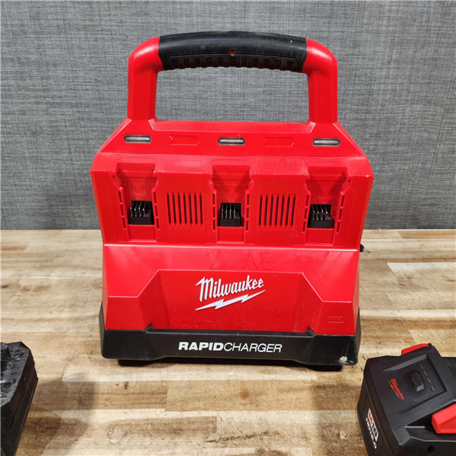 HOUSTON LOCATION - AS - IS Milwaukee 18V Lithium-Ion REDLITHIUM FORGE Starter Kit with (2) 12.0 Ah Battery Pack and PACKOUT 6-Port Rapid Charger