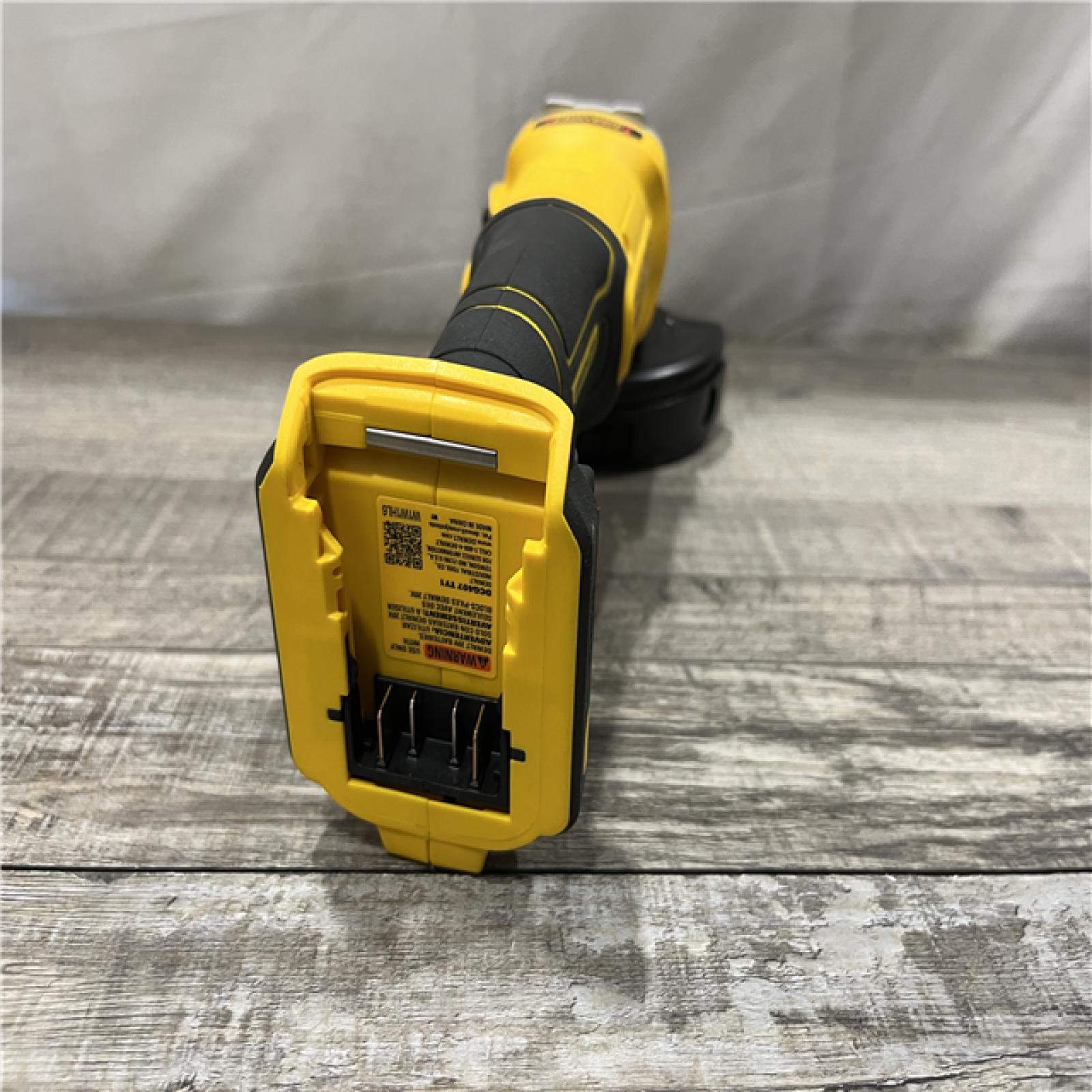 AS-IS DEWALT 20-Volt MAX Cordless Brushless 4-1/2 in. Angle Grinder with Slide Switch (Tool Only)