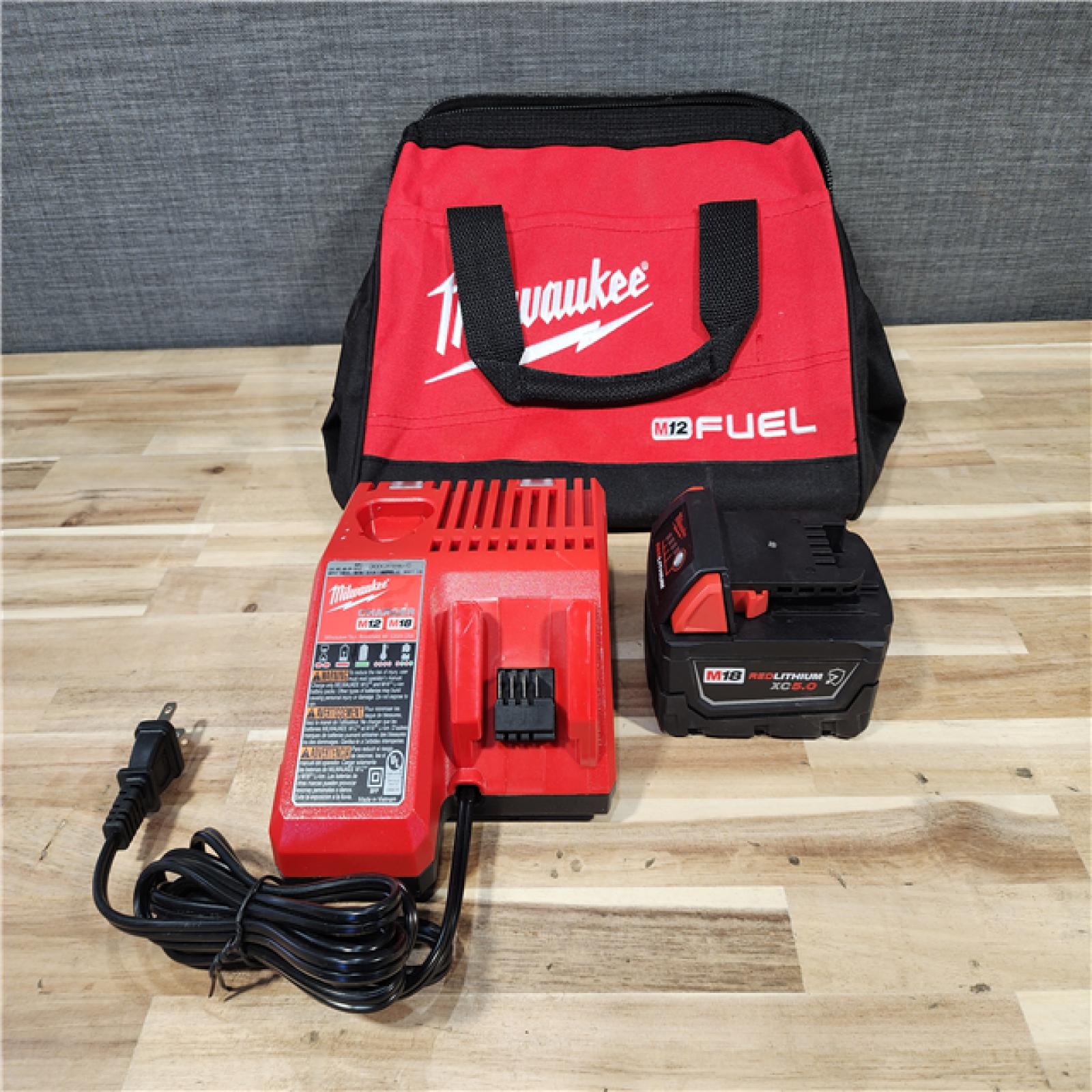 HOUSTON LOCATION - AS-IS Milwaukee  FUEL 18V Lithium-Ion Brushless Cordless 1/2 in. Impact Wrench w/Friction Ring Kit