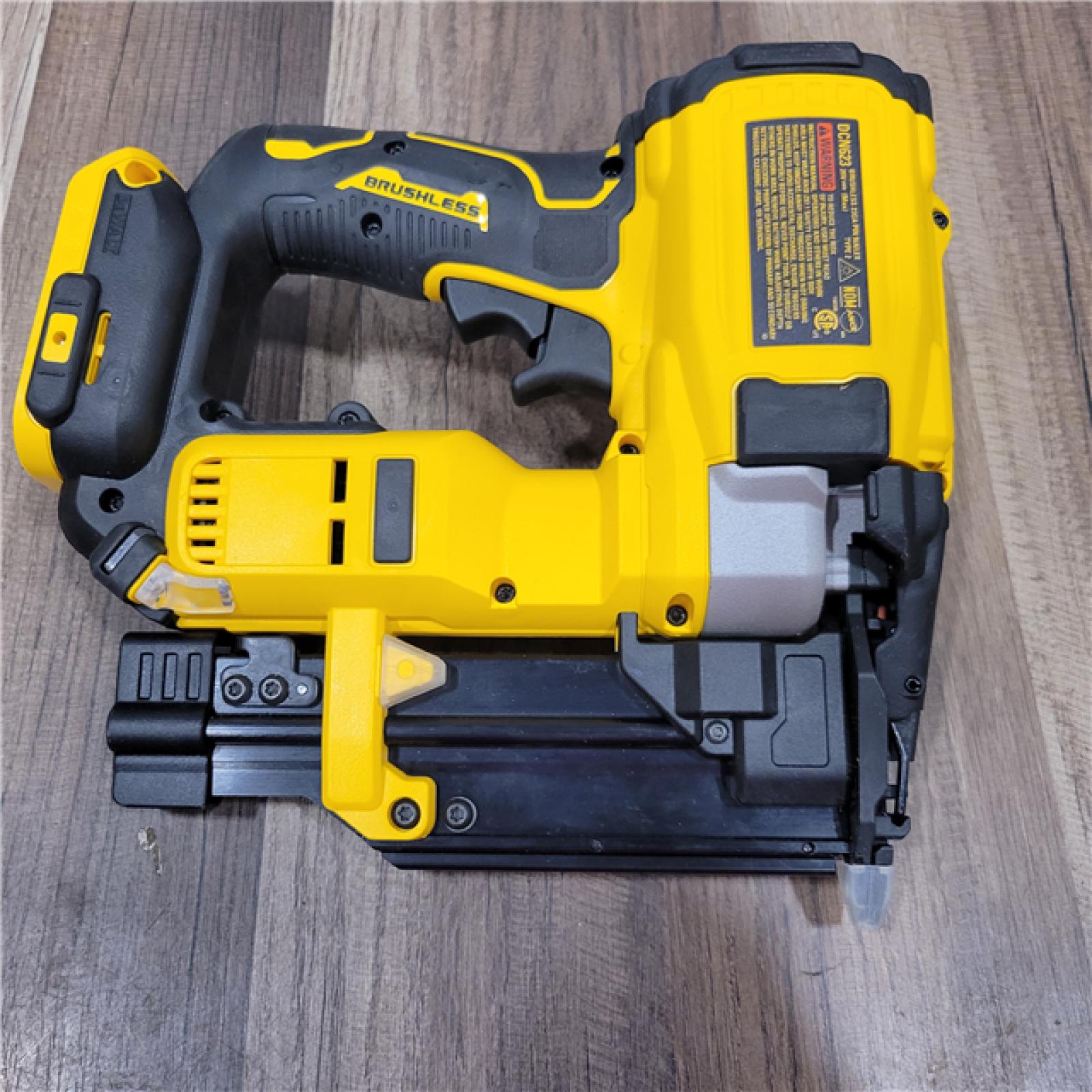 AS-IS DEWALT ATOMIC 20V MAX Lithium Ion Cordless 23 Gauge Pin Nailer Kit with 3.0Ah Battery and Charger