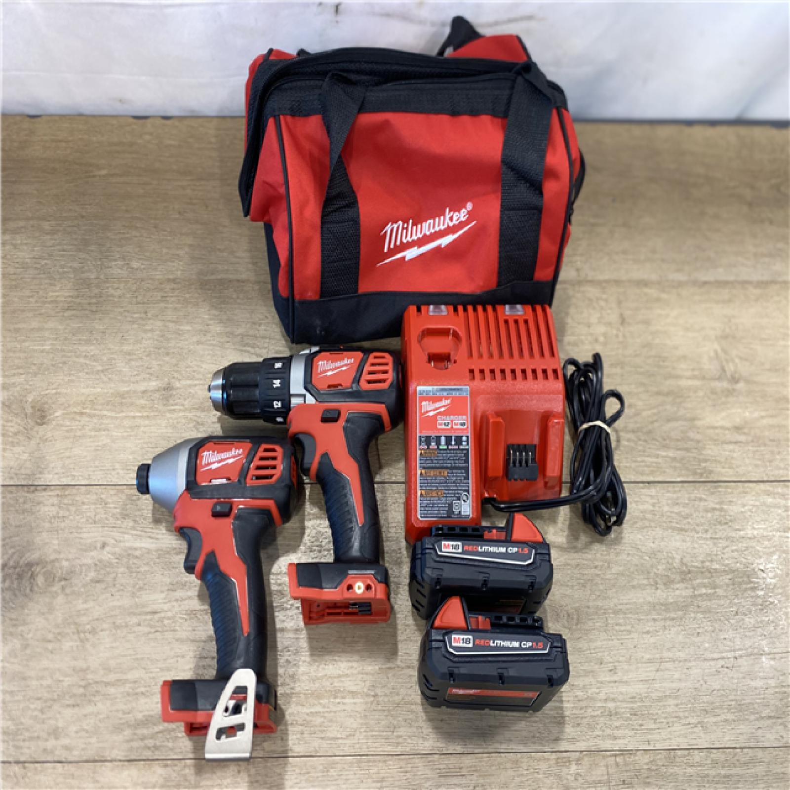 AS-IS Milwaukee 18V Lithium-Ion Cordless Drill Driver/Impact Driver Combo Kit