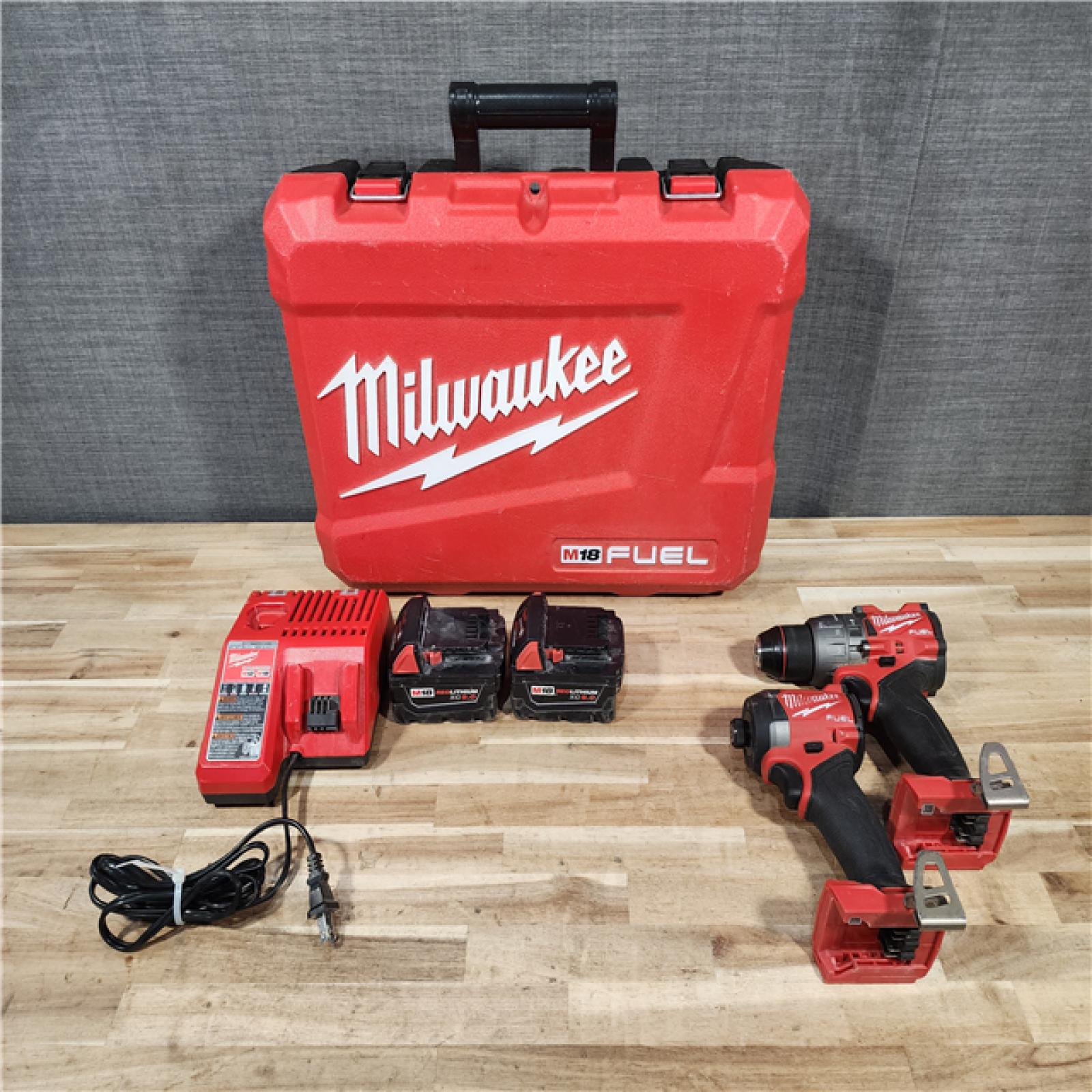 HOUSTON LOCATION - AS-IS Milwaukee  FUEL 18V Lithium-Ion Brushless Cordless Hammer Drill and Impact Driver Combo Kit