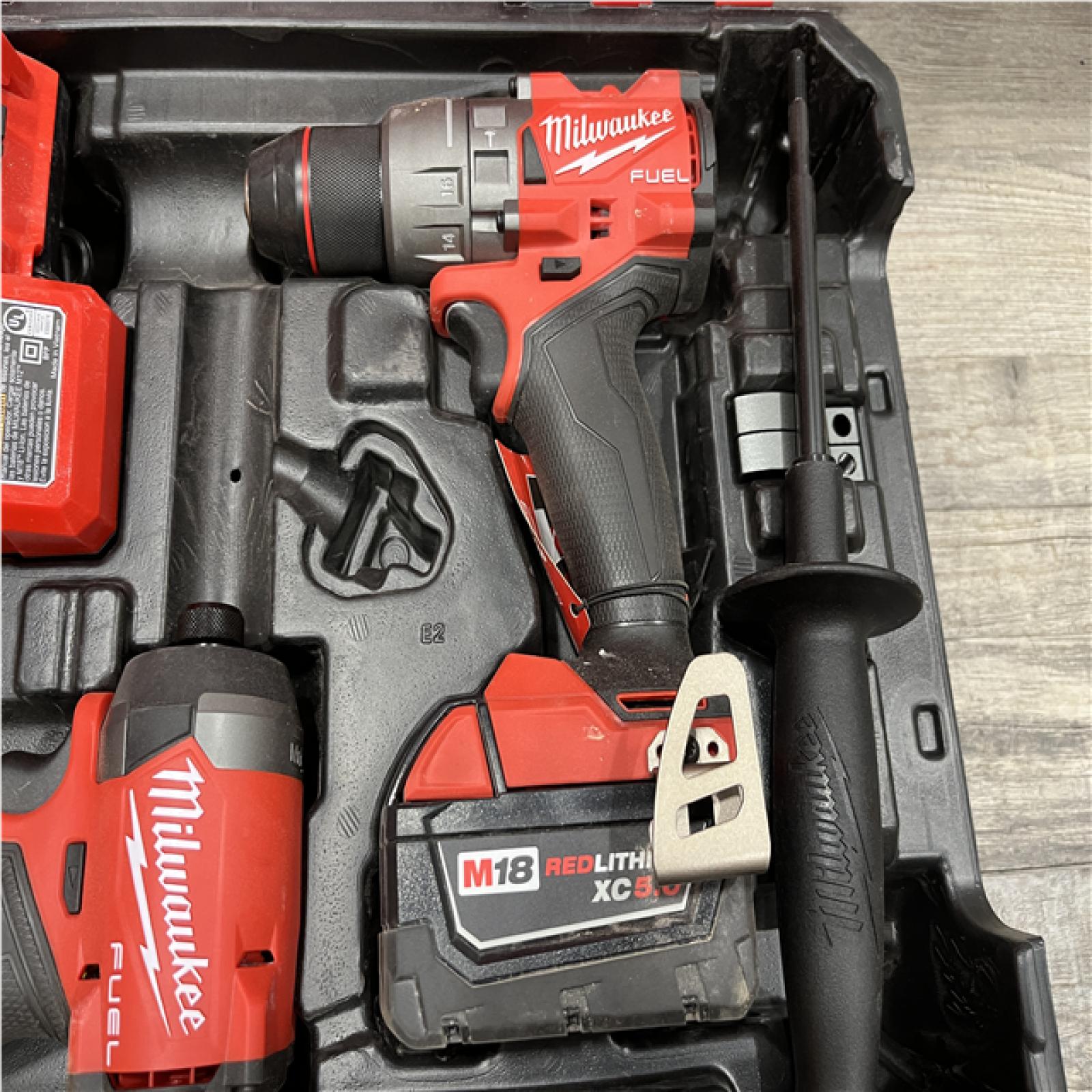 AS-IS Milwaukee FUEL 18V Lithium-Ion Brushless Cordless Hammer Drill and Impact Driver Combo Kit
