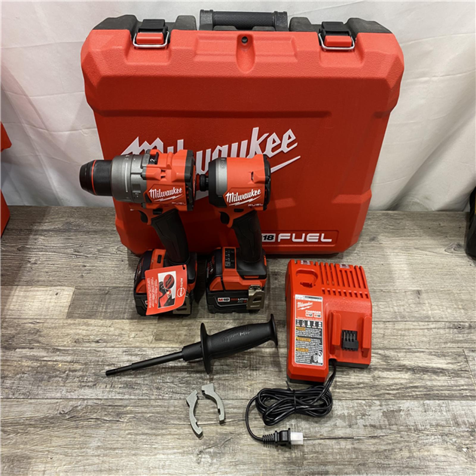 AS-IS Milwaukee FUEL 18V Lithium-Ion Brushless Cordless Hammer Drill and Impact Driver Combo Kit