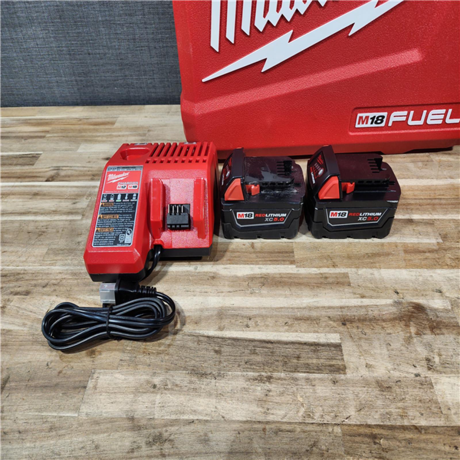 HOUSTON LOCATION - AS-IS Milwaukee FUEL 18V Lithium-Ion Brushless Cordless Hammer Drill and Impact Driver Combo Kit