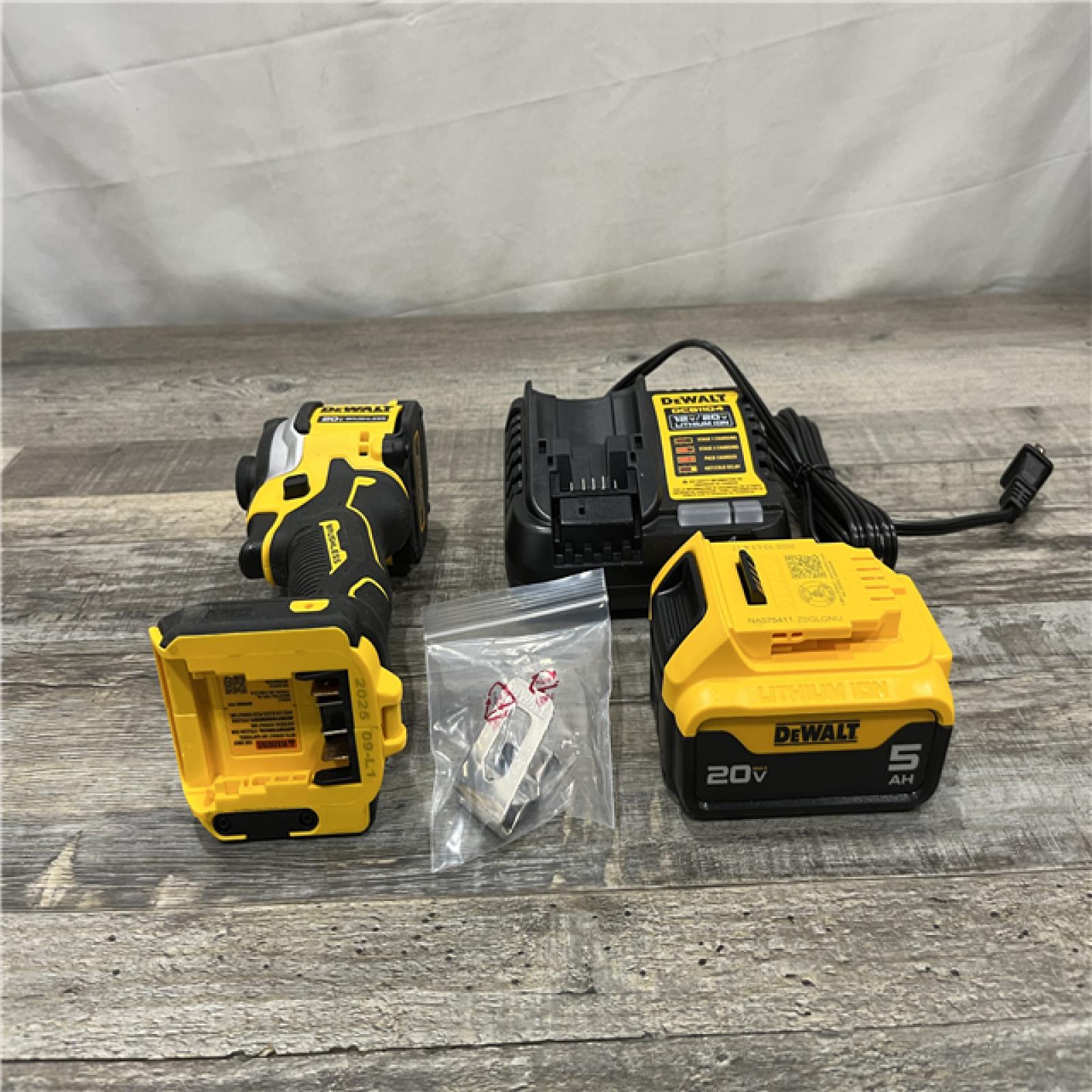 AS-IS DEWALT ATOMIC 20V MAX Lithium-Ion Cordless 1/4 in. Brushless Impact Driver Kit