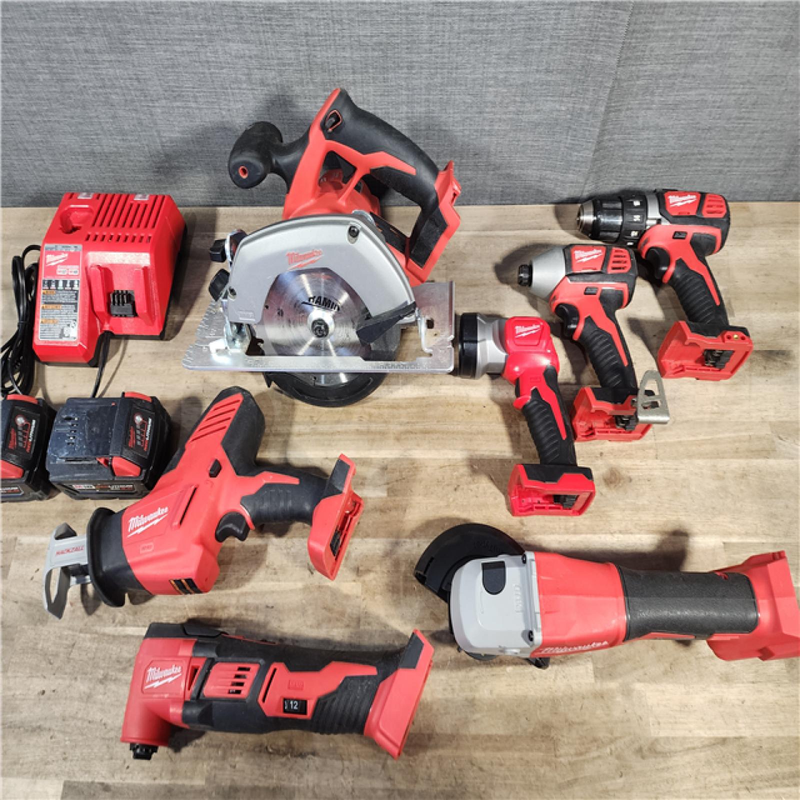 HOUSTON LOCATION - AS-IS Milwaukee M18 18-Volt Lithium-Ion Cordless Combo Kit 7-Tool with 2-Batteries, Charger