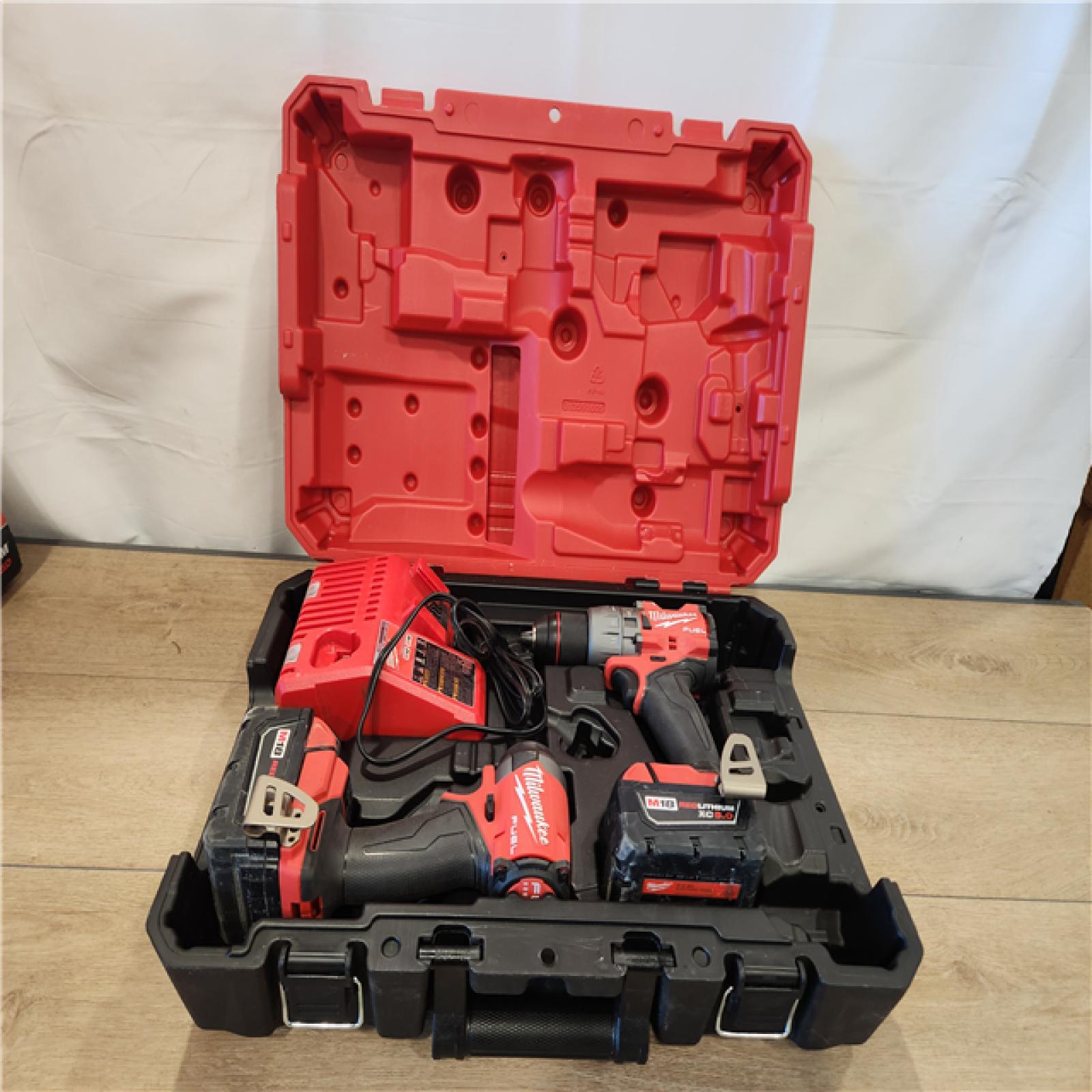 AS-IS- Milwaukee FUEL 18V Lithium-Ion Brushless Cordless Hammer Drill and Impact Driver Combo Kit