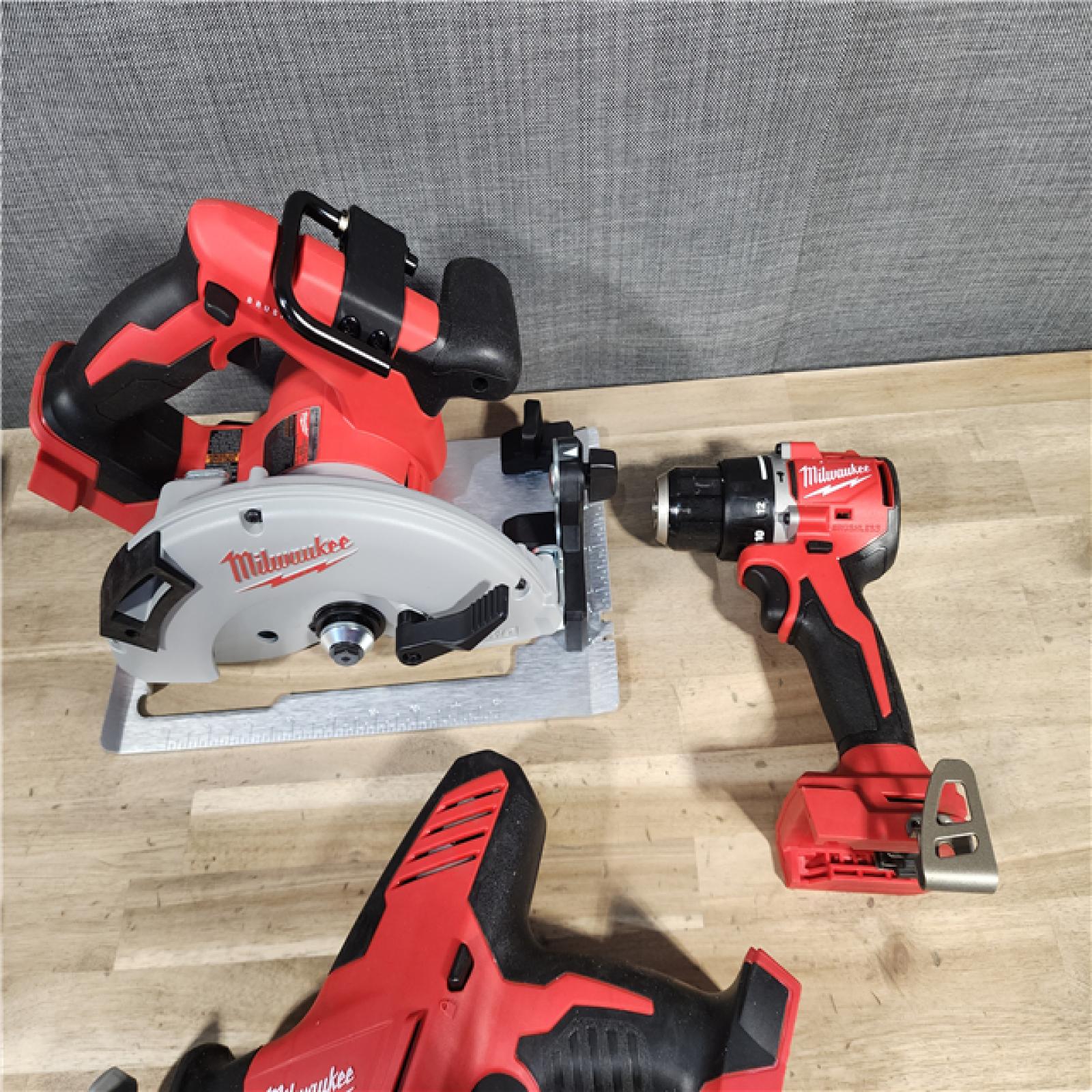 HOUSTON LOCATION - AS-IS Milwaukee M18 18-Volt Lithium-Ion Brushless Cordless Combo Kit (3-Tool) with 2-Batteries, 1-Charger and Tool Bag