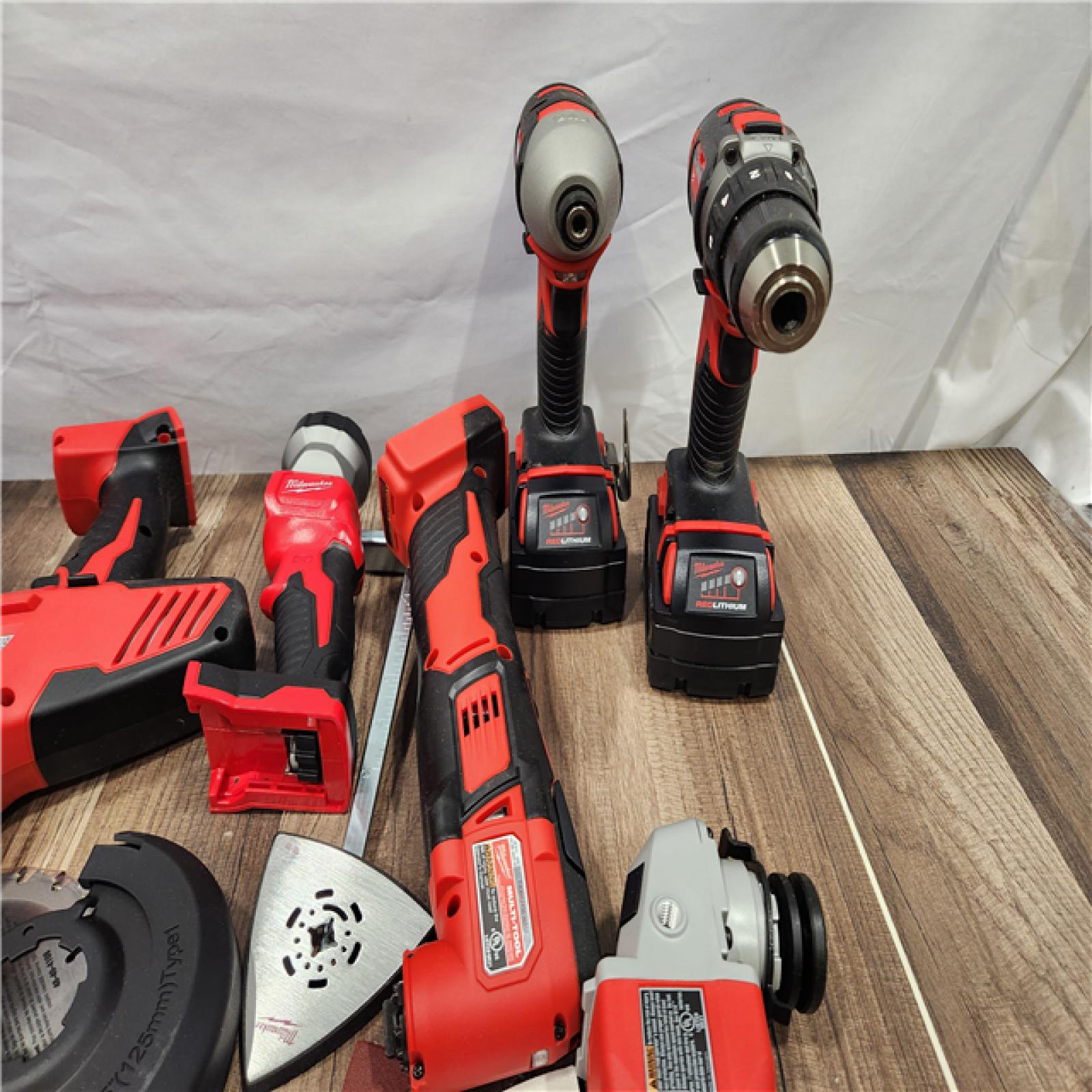 NEW! - M18 18-Volt Lithium-Ion Cordless Combo Kit 7-Tool with 2-Batteries, Charger and Tool Bag
