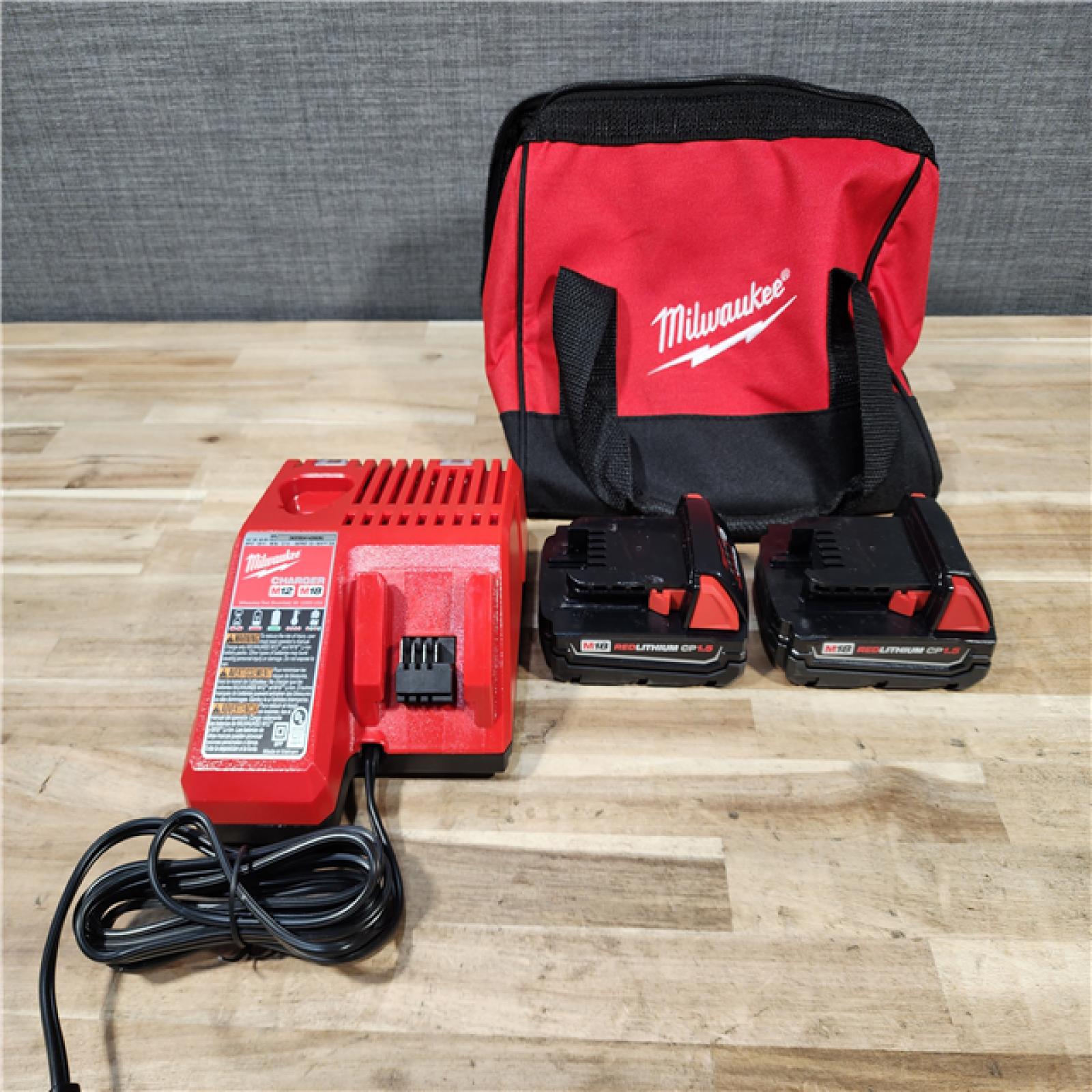 HOUSTON LOCATION - AS-IS Milwaukee 18V Lithium-Ion Cordless Drill Driver/Impact Driver Combo Kit