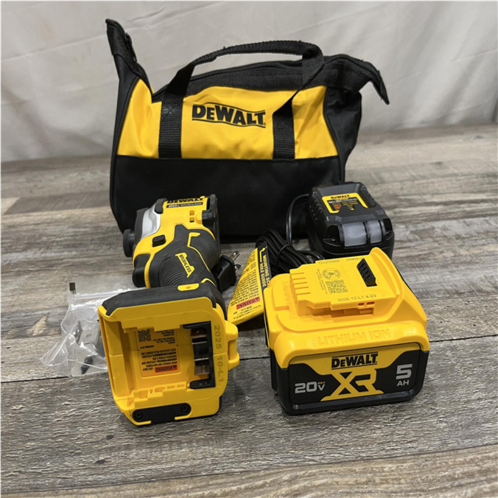 AS-IS DEWALT ATOMIC 20V MAX Lithium-Ion Cordless 1/4 in. Brushless Impact Driver Kit