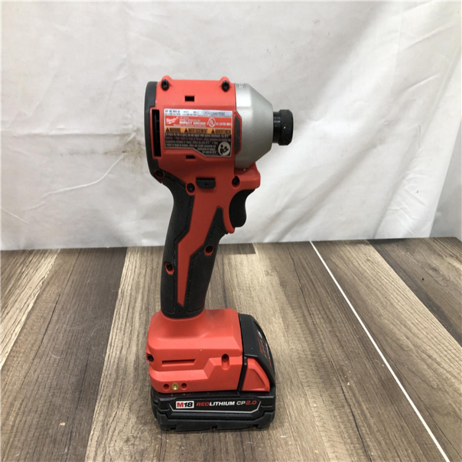 AS-IS Milwaukee M18 18V Lithium-Ion Brushless Cordless 1/4 in. Impact Driver Kit