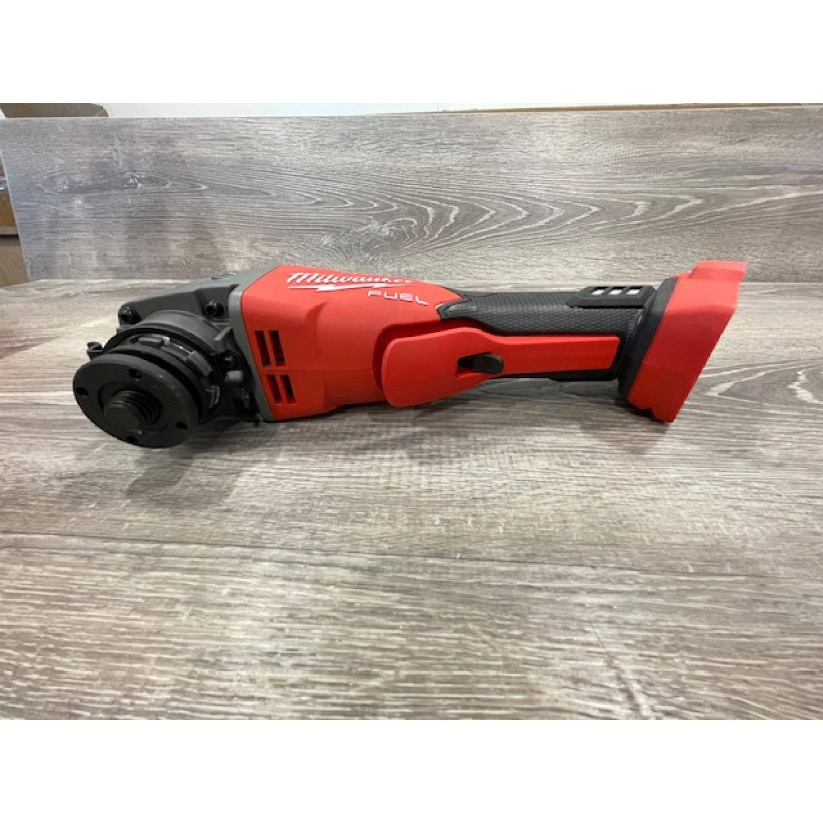 AS-IS Milwaukee FUEL 18V Lithium-Ion Brushless Cordless 4-1/2 in./5 in. Grinder w/Paddle Switch (Tool-Only)