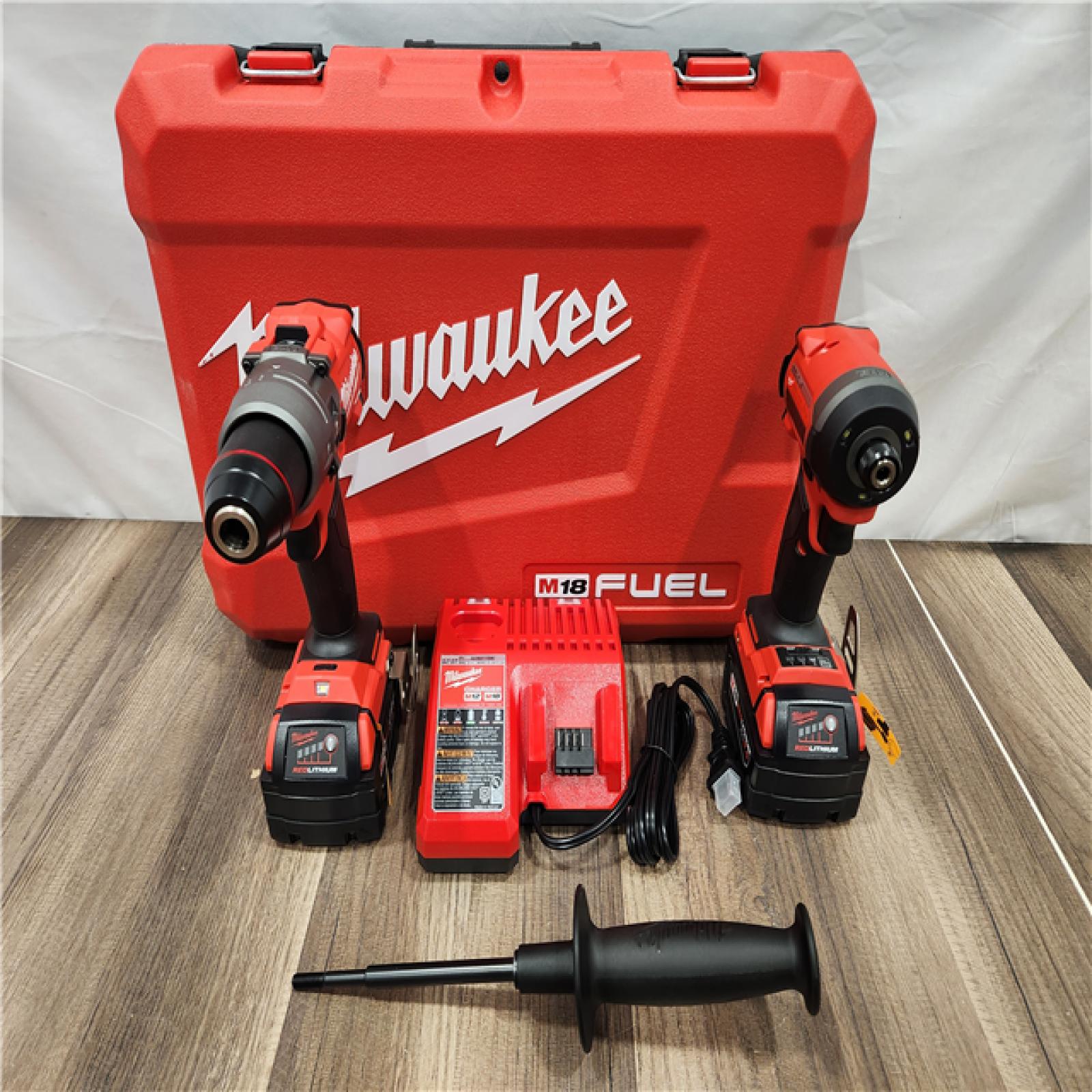 AS-IS Milwaukee M18 FUEL 18V Lithium-Ion Brushless Cordless Hammer Drill and Impact Driver Combo Kit (2-Tool) with 2 Batteries
