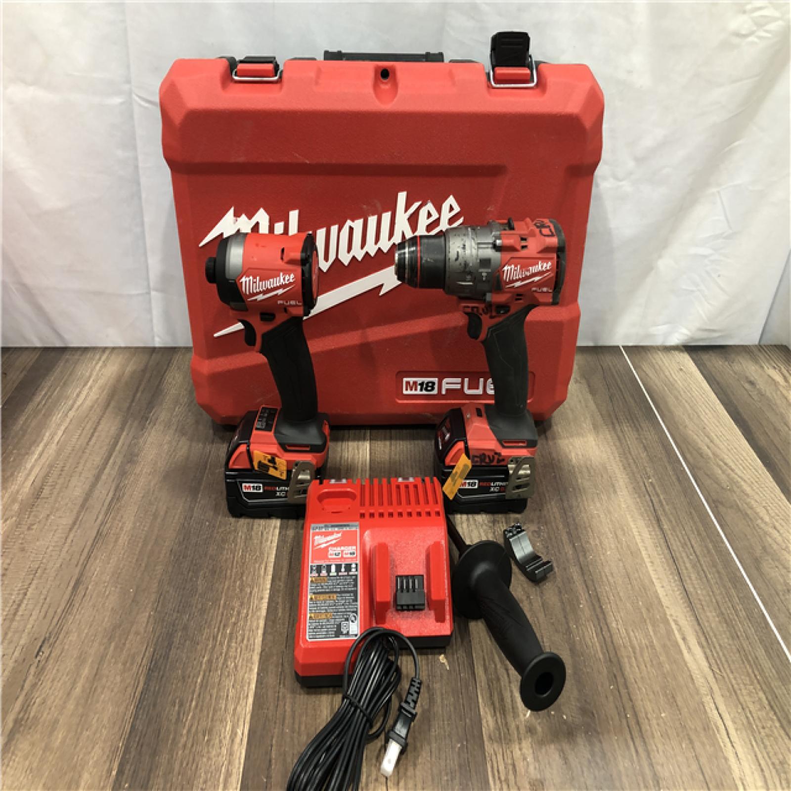 AS-IS Milwaukee FUEL 18V Lithium-Ion Brushless Cordless Hammer Drill and Impact Driver Combo Kit