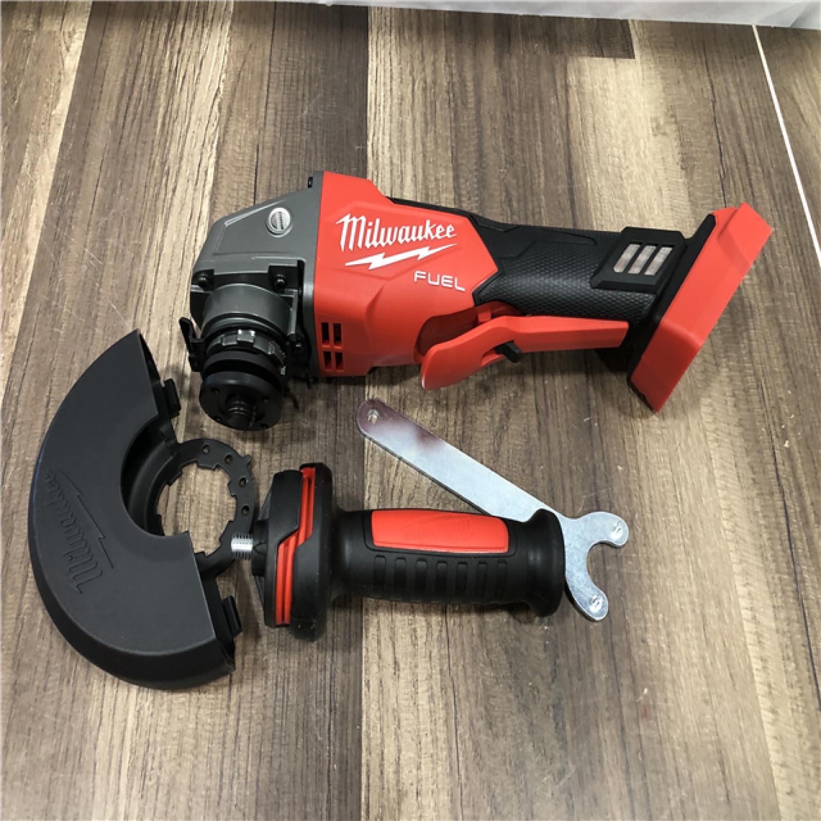 AS-IS Milwaukee FUEL 18V Lithium-Ion Brushless Cordless 4-1/2 in./5 in. Grinder w/Paddle Switch (Tool-Only)