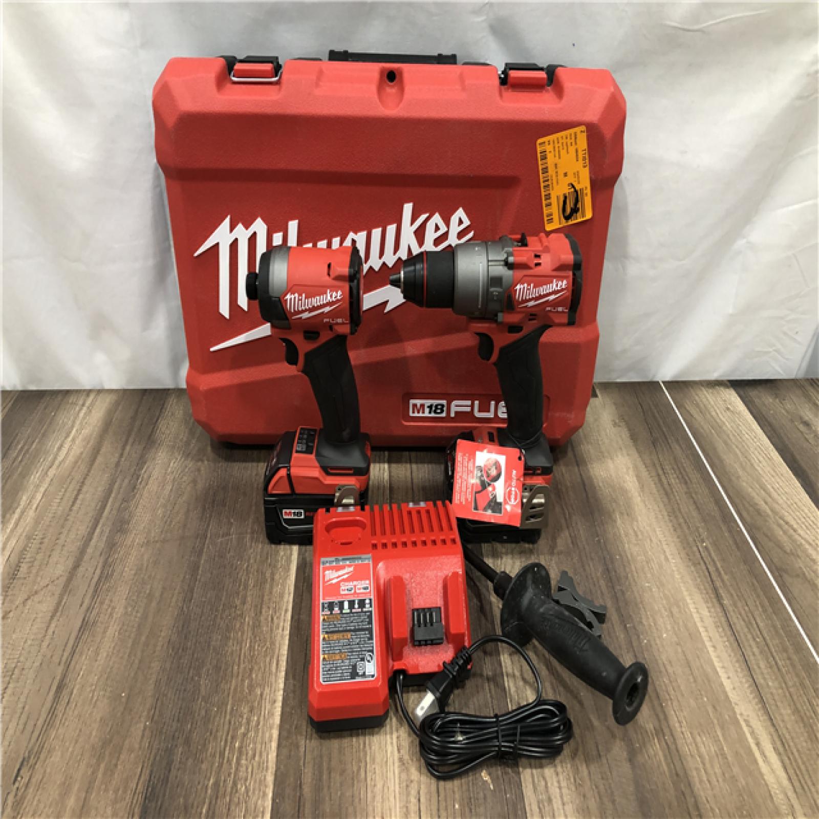 AS-IS Milwaukee FUEL 18V Lithium-Ion Brushless Cordless Hammer Drill and Impact Driver Combo Kit