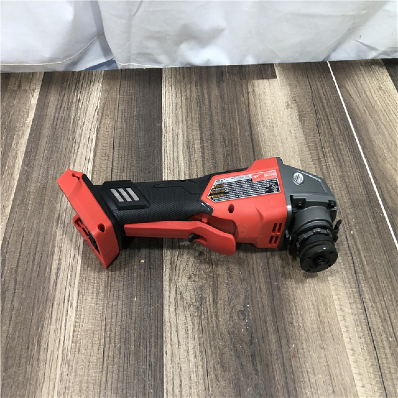 AS-IS Milwaukee FUEL 18V Lithium-Ion Brushless Cordless 4-1/2 in./5 in. Grinder with Variable Speed & Paddle Switch (Tool-Only)