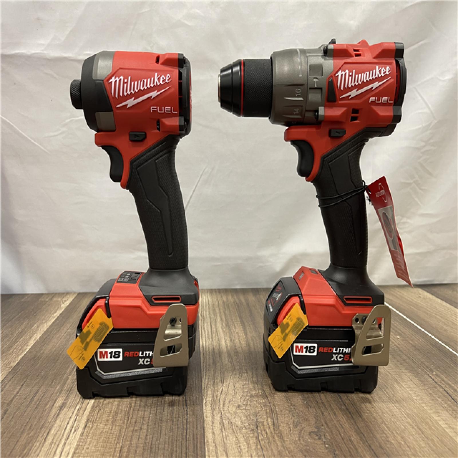 AS-IS Milwaukee M18 FUEL 18V Lithium-Ion Brushless Cordless Hammer Drill and Impact Driver Combo Kit