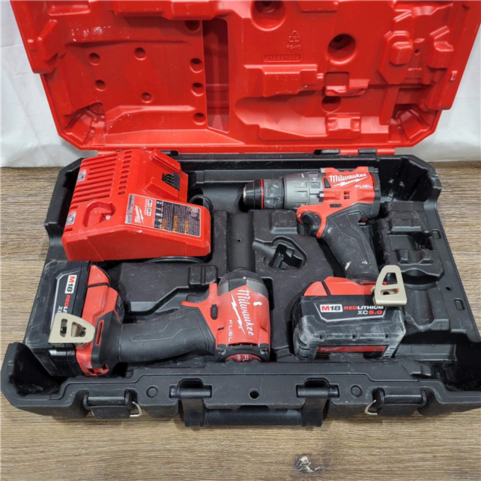 AS-IS Milwaukee M18 FUEL 18V Lithium-Ion Brushless Cordless Hammer Drill and Impact Driver Combo Kit (2-Tool) with 2 Batteries