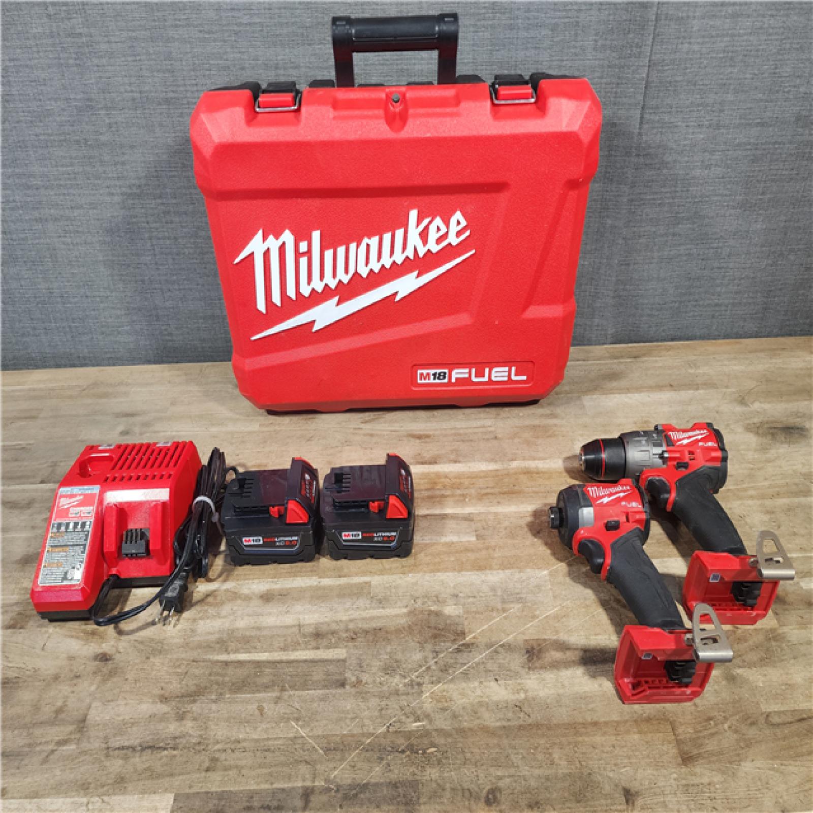 HOUSTON LOCATION - AS-IS MILWAUKEE FUEL 18V Lithium-Ion Brushless Cordless Hammer Drill and Impact Driver Combo Kit