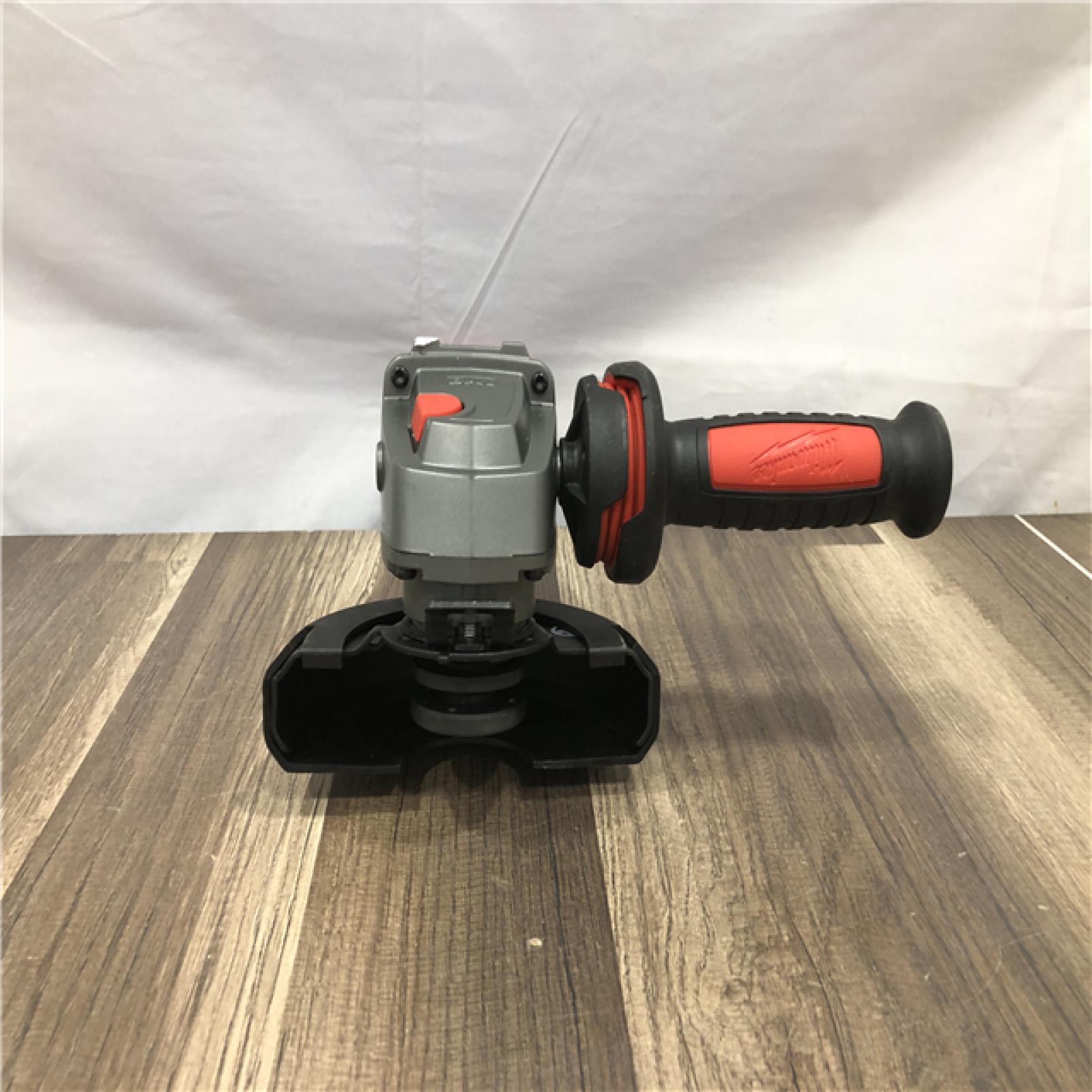 AS-IS Milwaukee FUEL 18V Lithium-Ion Brushless Cordless 4-1/2 in./5 in. Grinder w/Paddle Switch (Tool-Only)