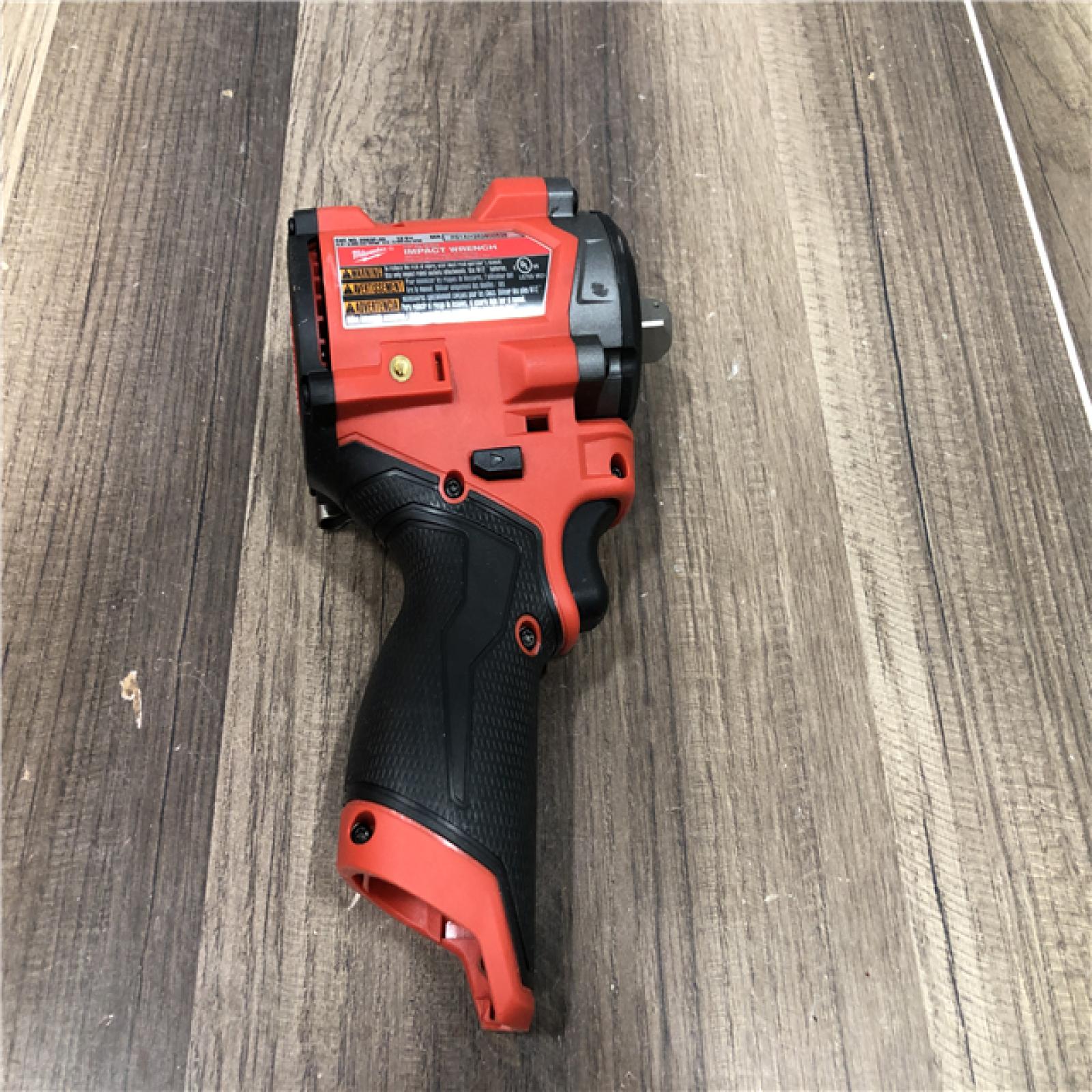 AS-IS  Milwaukee FUEL 12V Lithium-Ion Brushless Cordless Stubby 1/2 in. Impact Wrench with Pin Detent (Tool-Only)