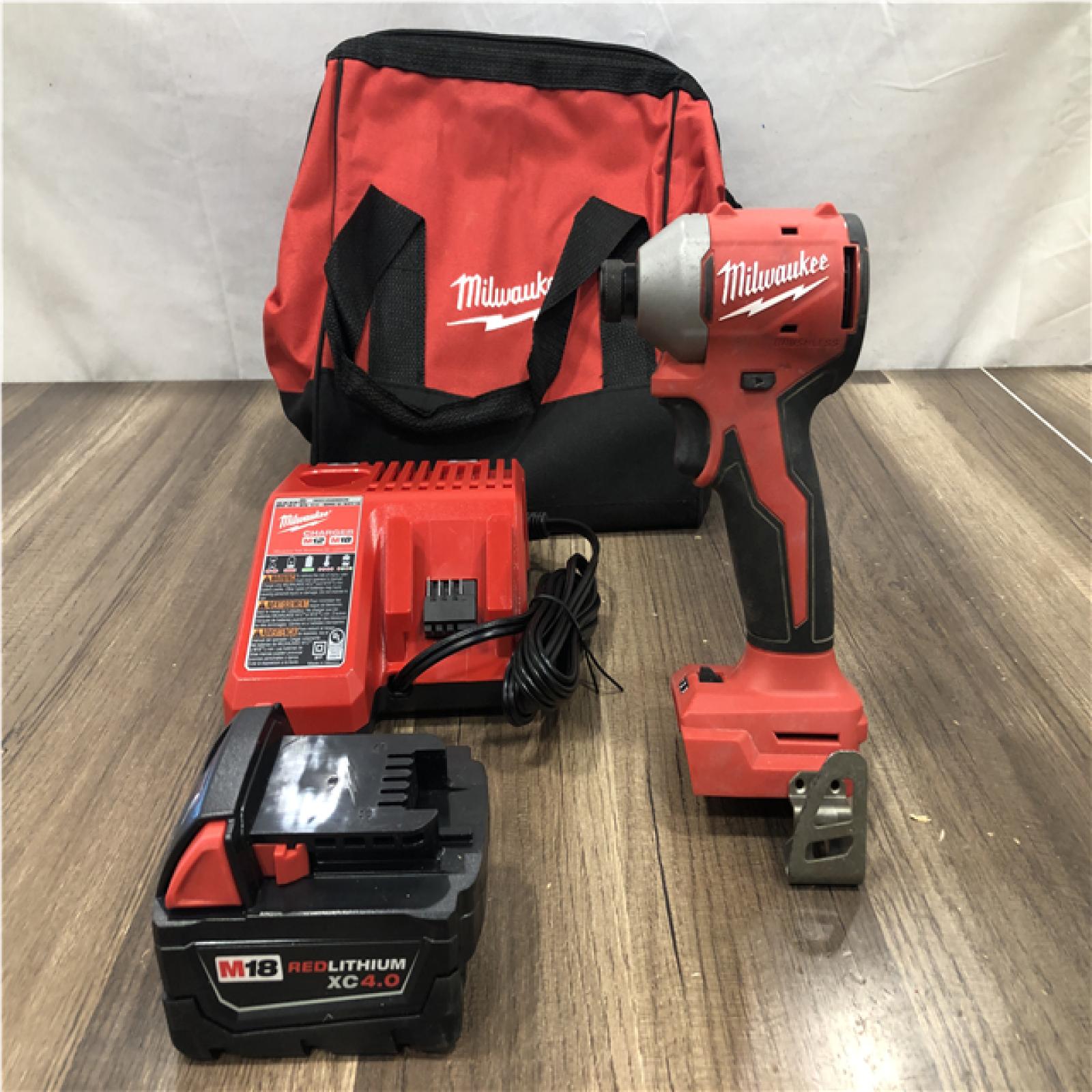 AS-IS Milwaukee 18V Lithium-Ion Compact Brushless Cordless 1/4 in. Impact Driver Kit