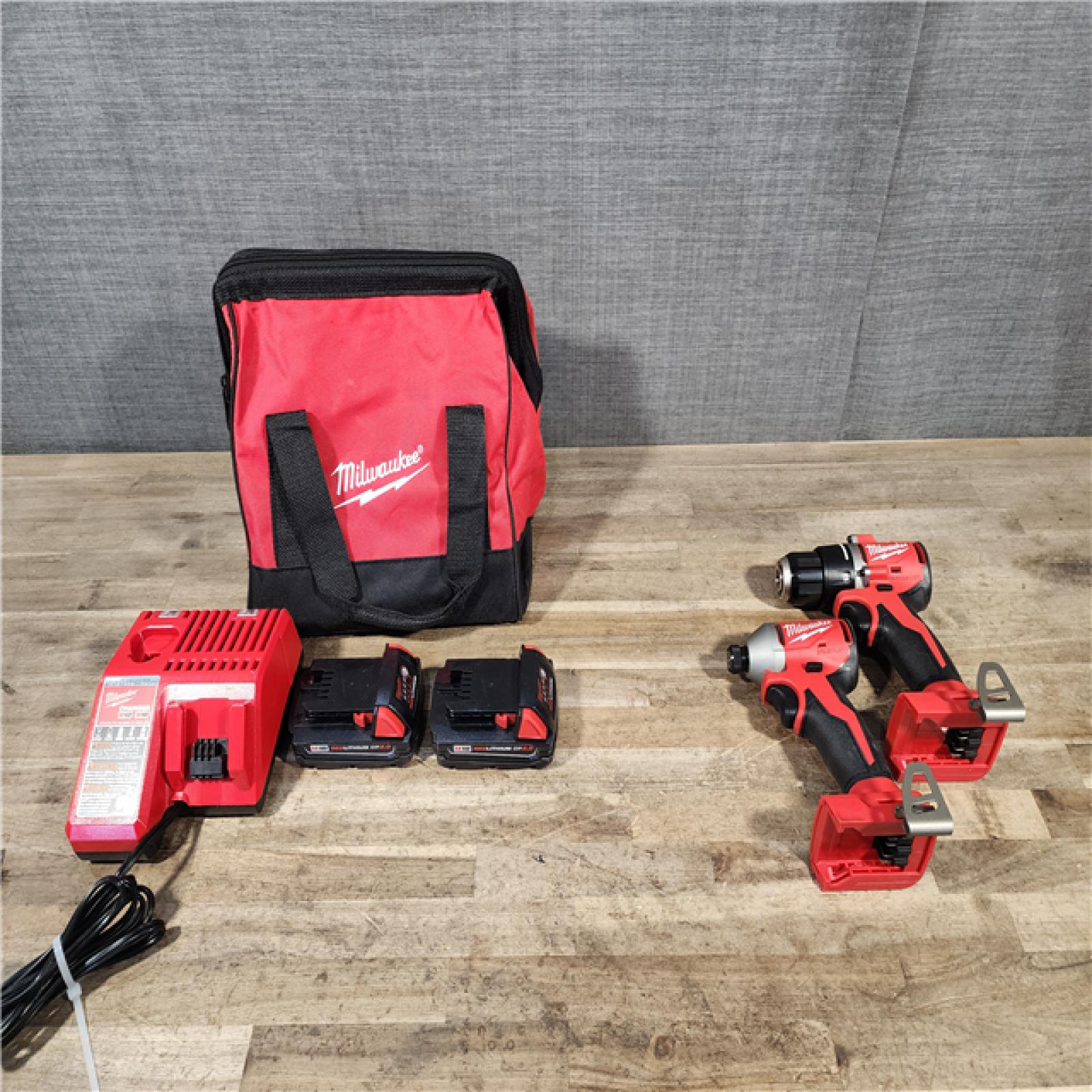 HOUSTON LOCATION - AS-IS Milwaukee M18 18V Lithium-Ion Brushless Cordless Compact Drill/Impact Combo Kit (2-Tool) W/(2) 2.0 Ah Batteries  Charger & Bag