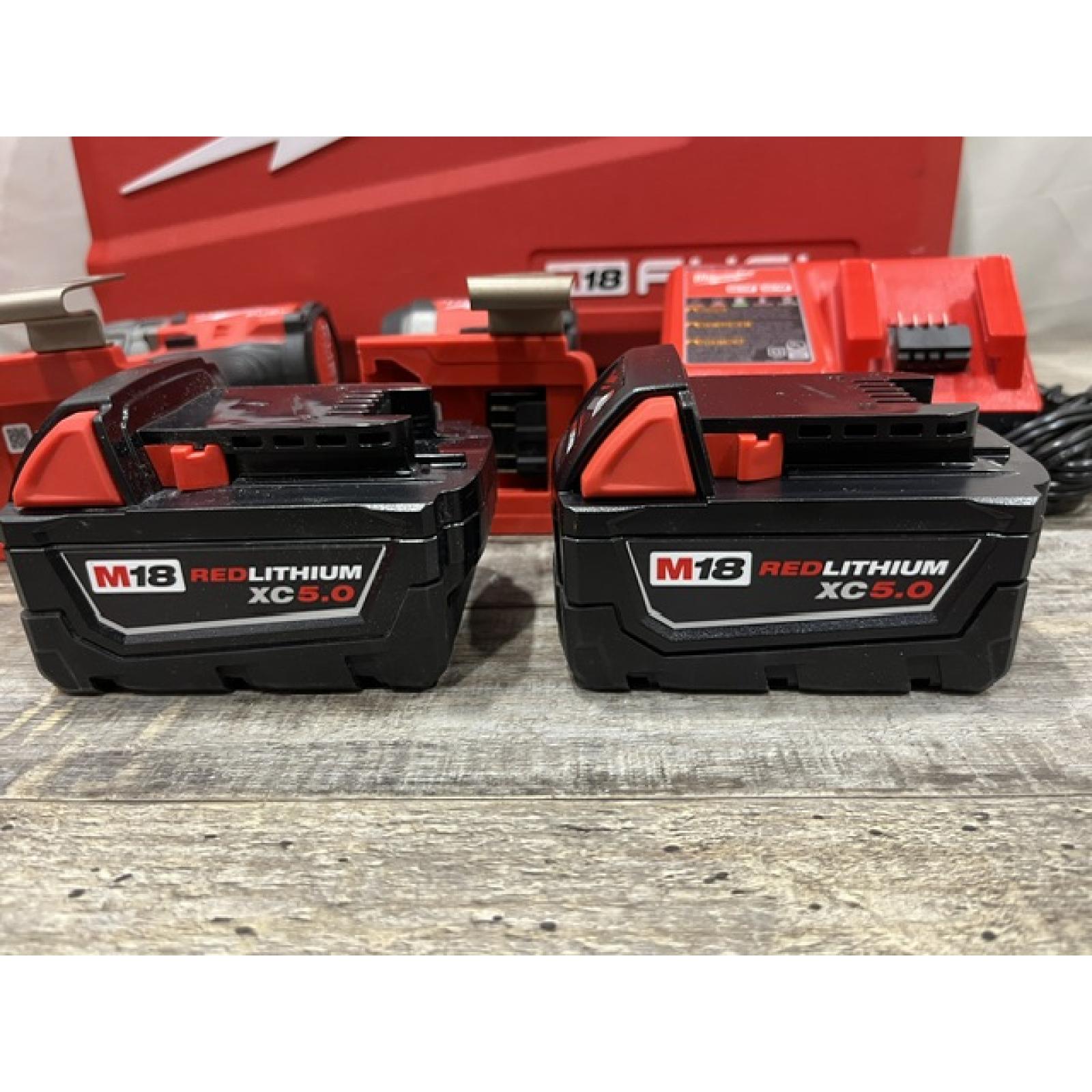 AS-IS Milwaukee FUEL 18V Lithium-Ion Brushless Cordless Hammer Drill and Impact Driver Combo Kit