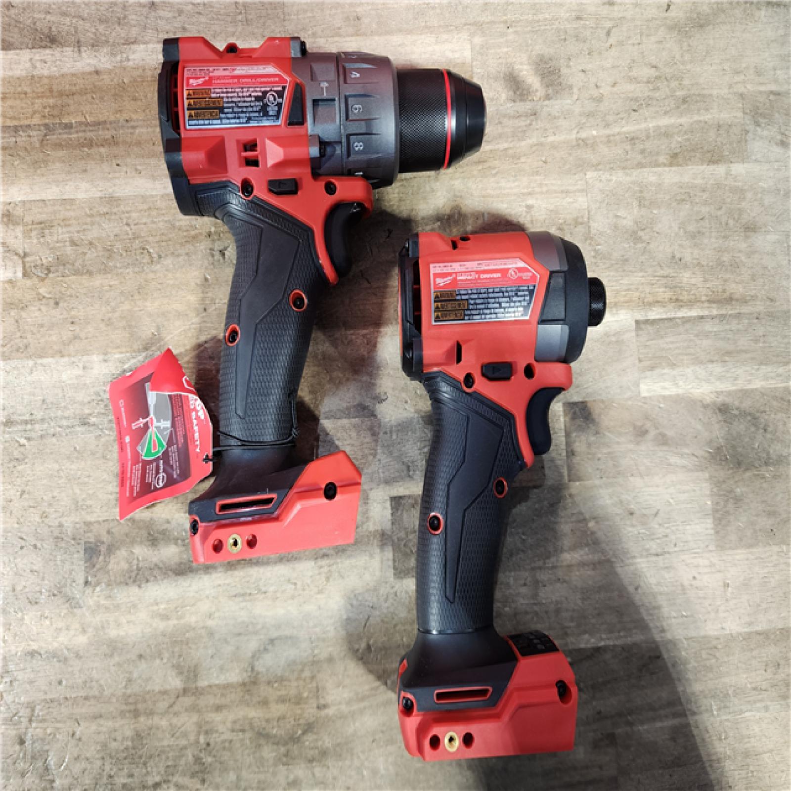HOUSTON LOCATION - AS-IS Milwaukee FUEL 18V Lithium-Ion Brushless Cordless Hammer Drill and Impact Driver Combo Kit