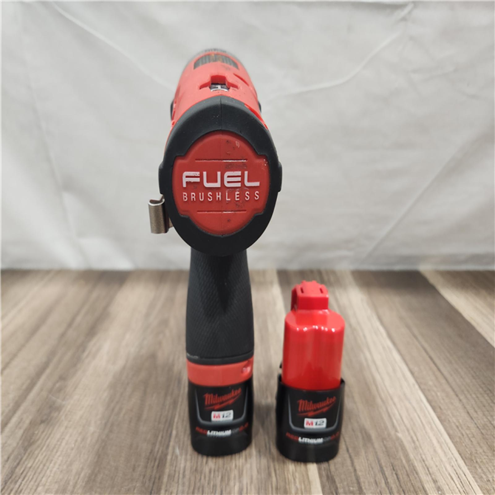 AS-IS- Milwaukee M12 FUEL SURGE 12V Lithium-Ion Brushless Cordless 1/4 in. Hex Impact Driver Compact Kit W/Two 2.0Ah Batteries  Bag