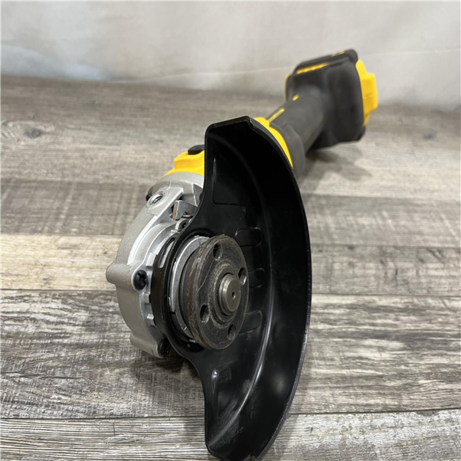 AS-IS DEWALT 20-Volt MAX Cordless Brushless 4-1/2 in. Angle Grinder with Slide Switch (Tool Only)