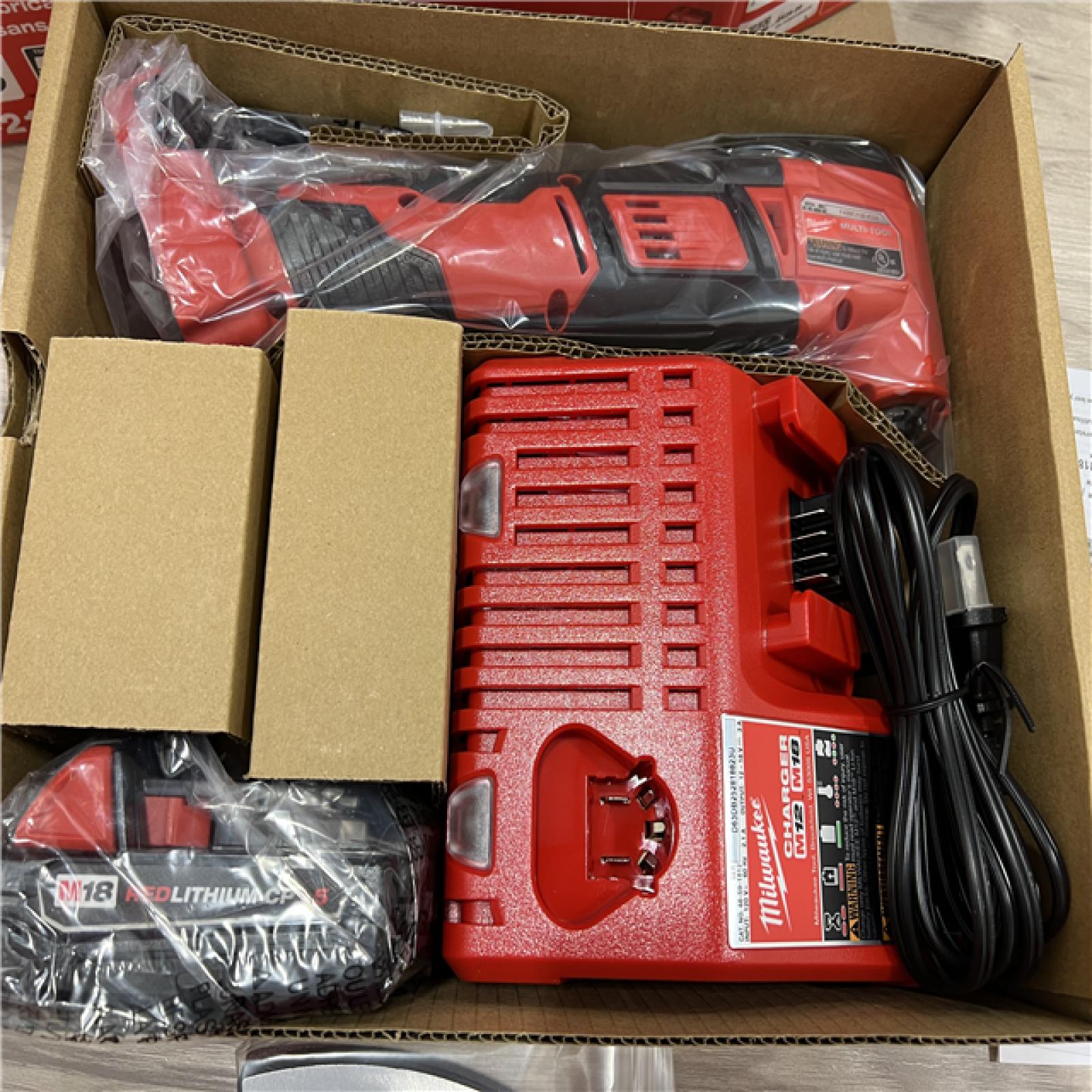 AS-IS Milwaukee 2626-2 M18 18V Cordless Oscillating Multi-Tool Variable Speed  REDLITHIUM Battery Compatible  Fast Cutting  Sanding & Scraping Kit