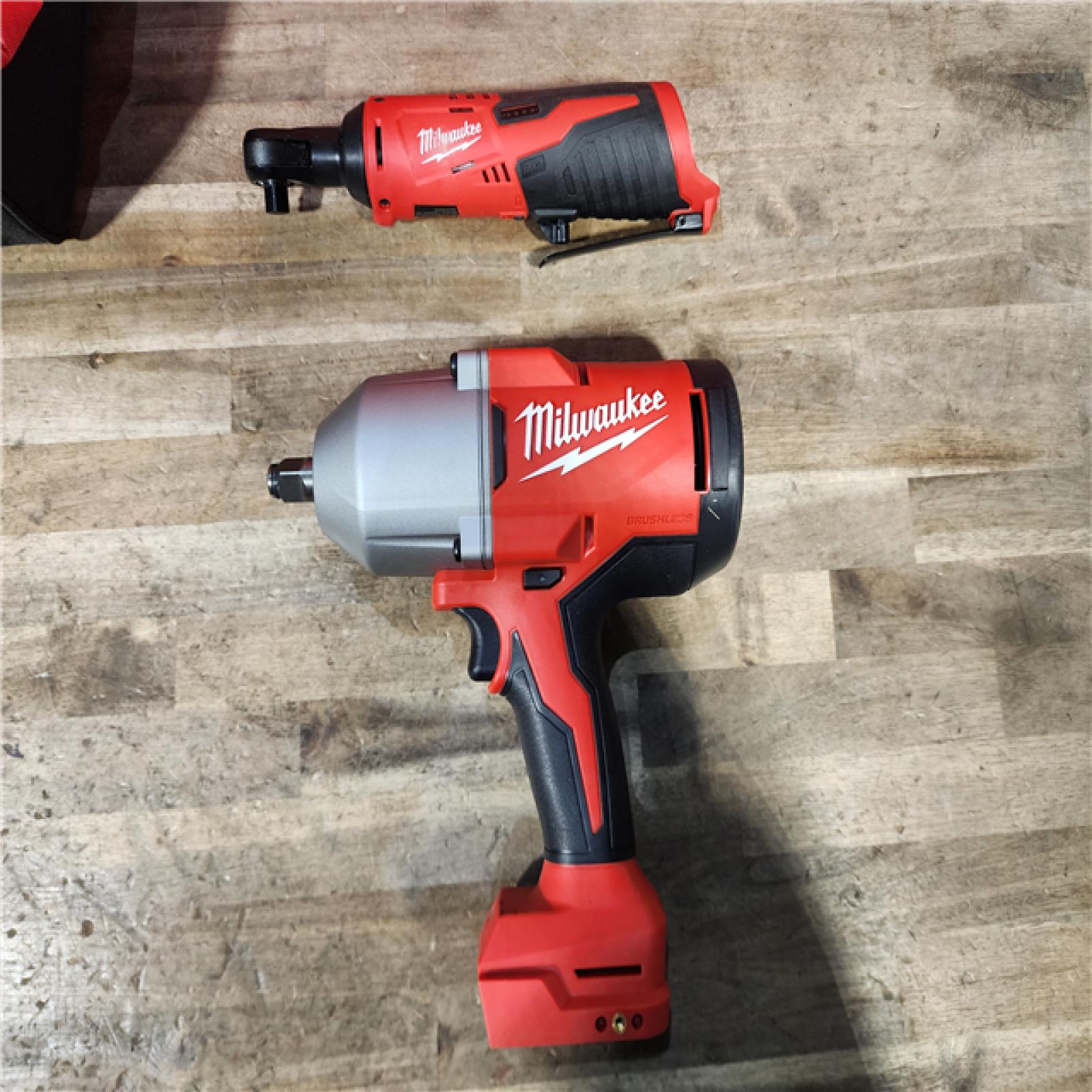 HOUSTON LOCATION - AS-IS (APPEARS LIKE NEW) Milwaukee M12/M18 12/18V Lithium-Ion Cordless 3/8 in. Ratchet and 1/2 in. High Torque Impact Wrench with Friction Ring Combo Kit