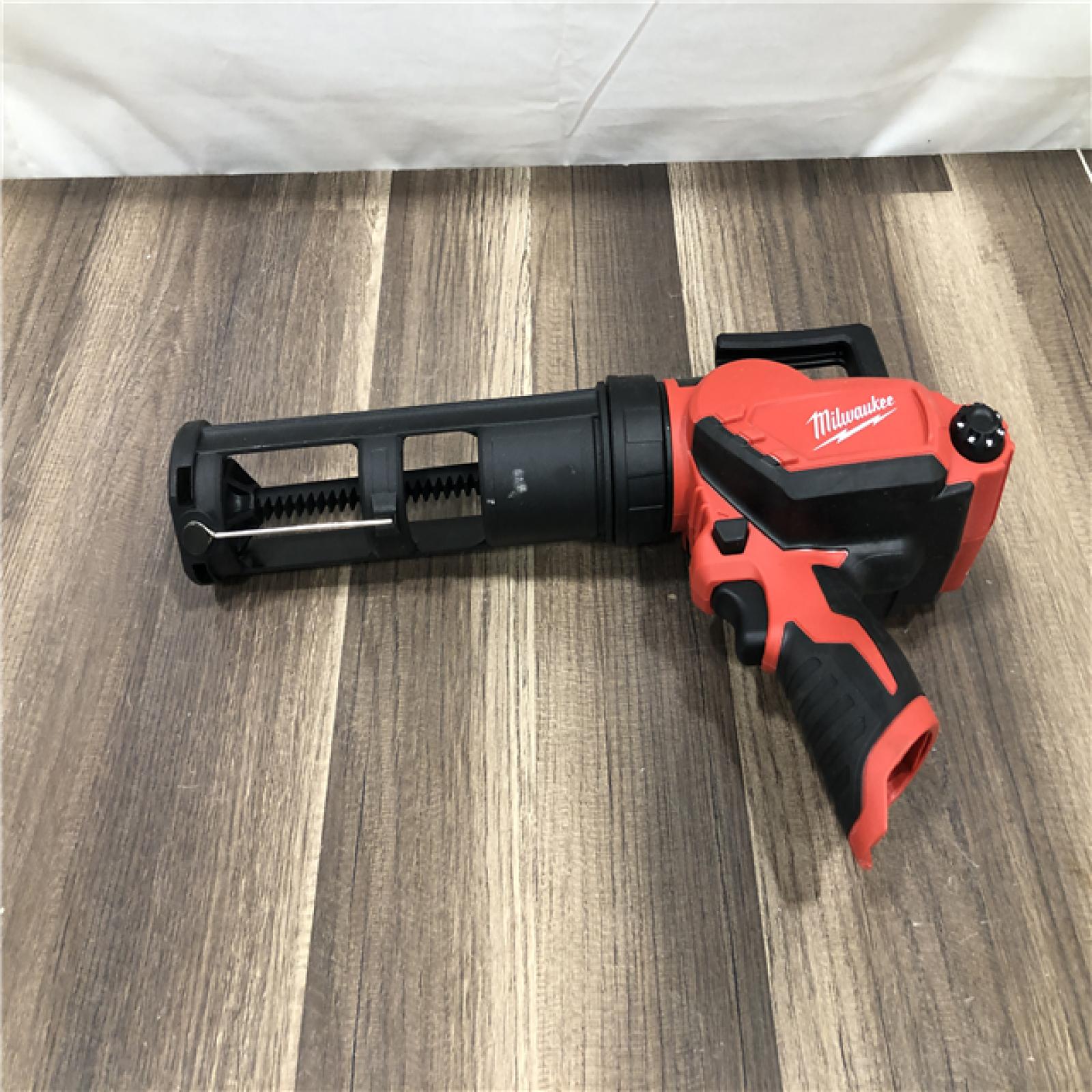 AS-IS Milwaukee 12V Lithium-Ion Cordless 10 oz. Adhesive and Caulk Gun (Tool-Only)