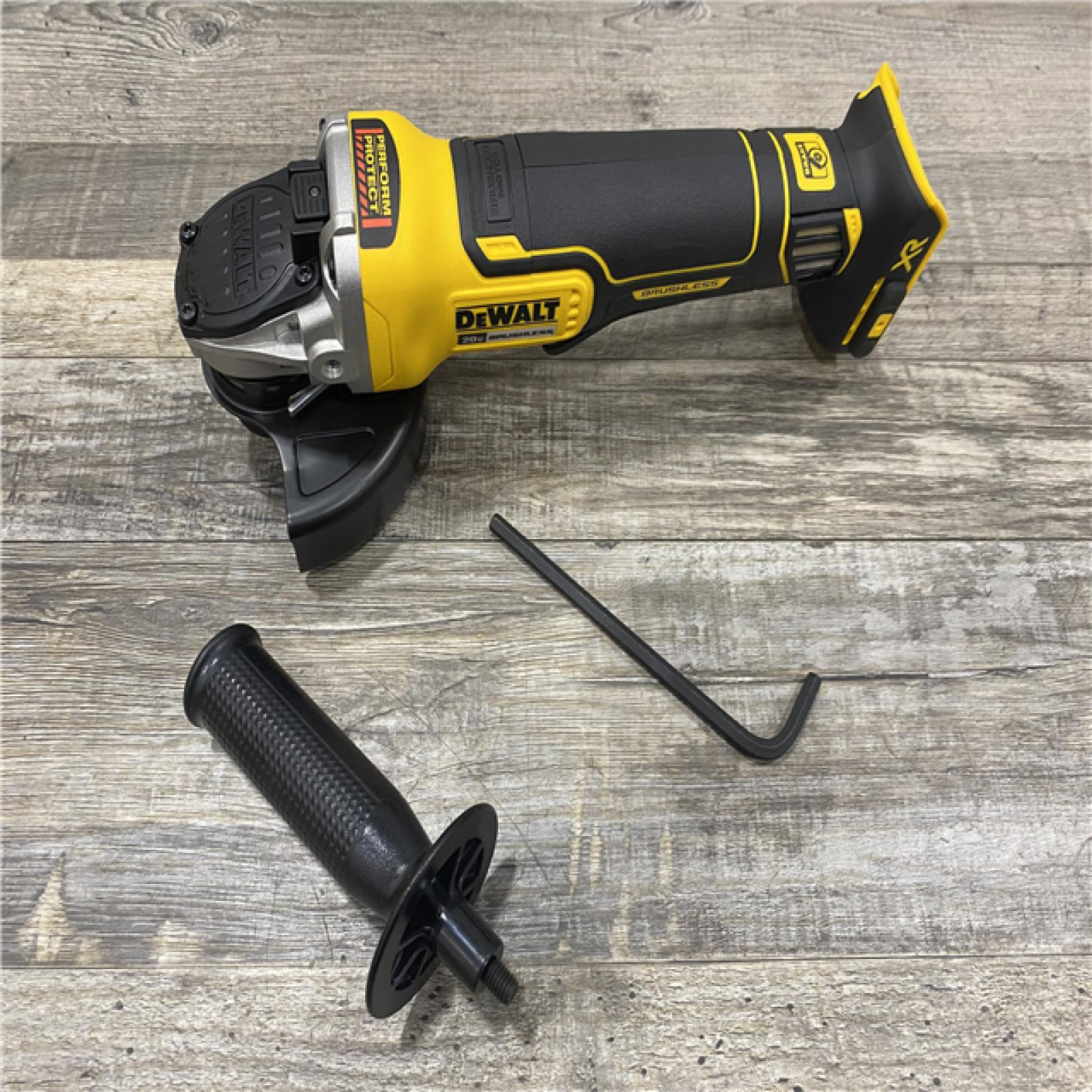 AS-IS DEWALT 20V MAX XR Cordless Brushless 4.5 in. Paddle Switch Small Angle Grinder with Kickback Brake (Tool Only)