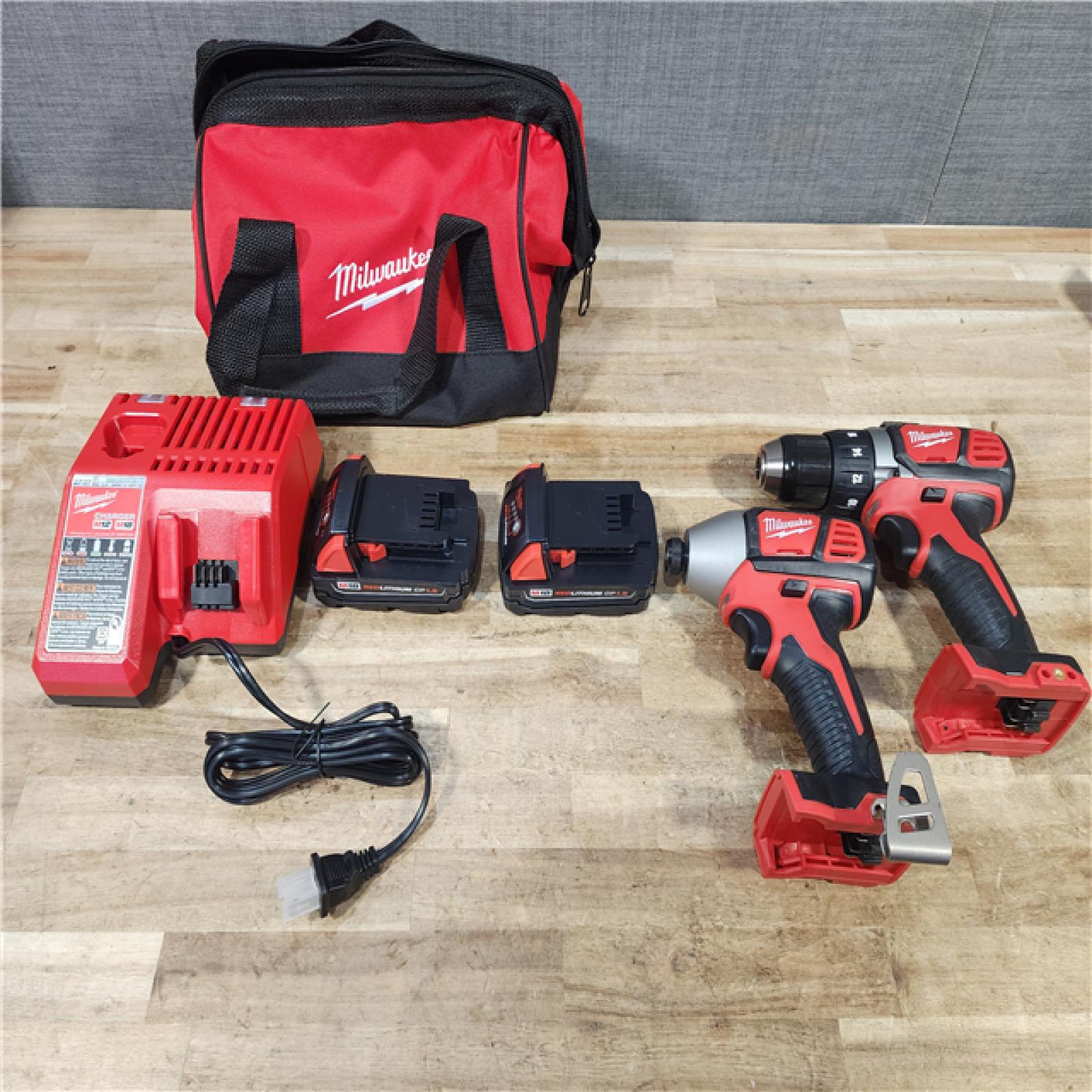 HOUSTON LOCATION - AS - IS Milwaukee 18V Lithium-Ion Cordless Drill Driver/Impact Driver Combo Kit