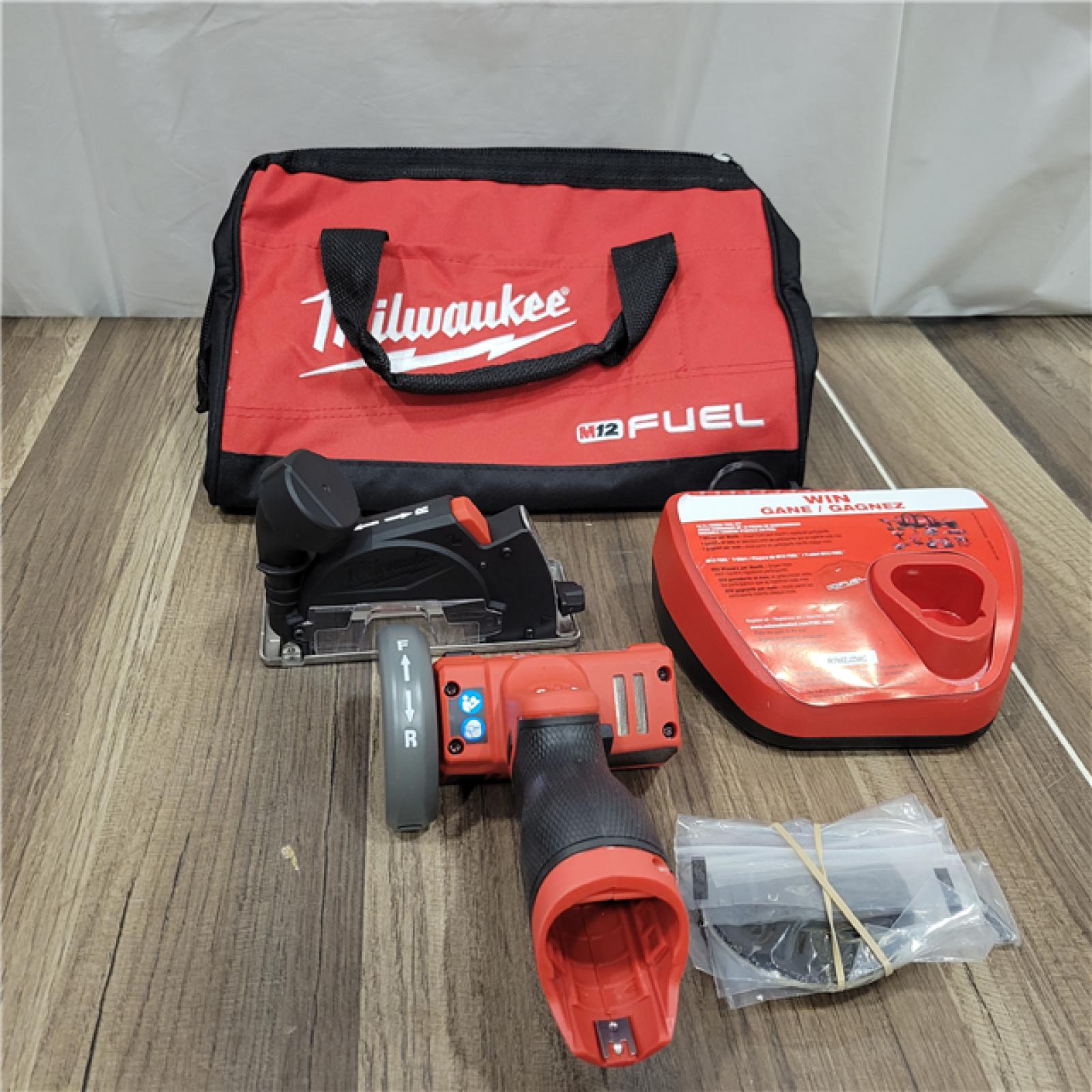 AS-IS  Milwaukee  M12 FUEL 12V 3 in. Lithium-Ion Brushless Cordless Cut Off Saw Kit with One 4.0 Ah Battery Charger and Bag