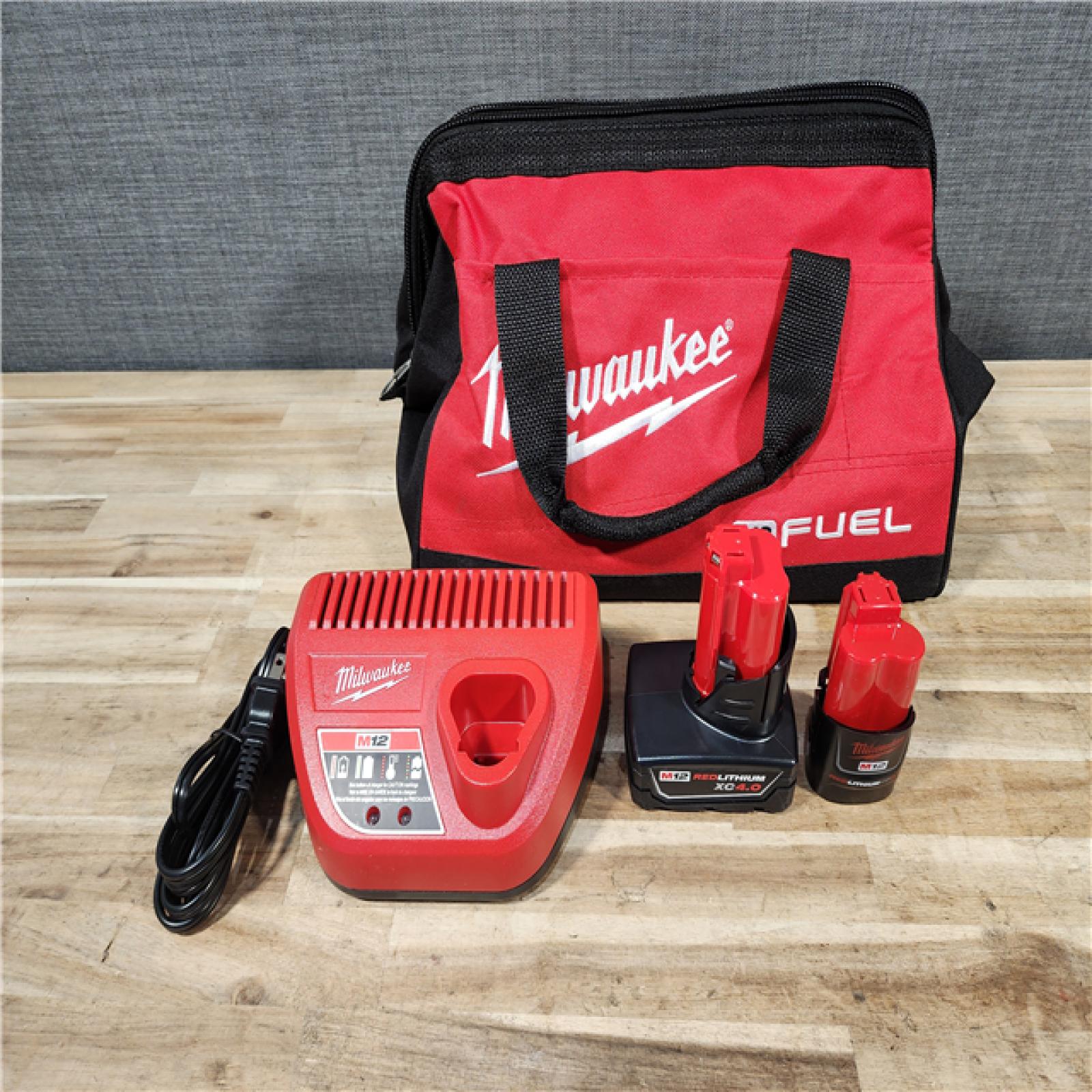 HOUSTON LOCATION - AS-IS Milwaukee  FUEL 12-Volt Lithium-Ion Brushless Cordless Hammer Drill and Impact Driver Combo Kit